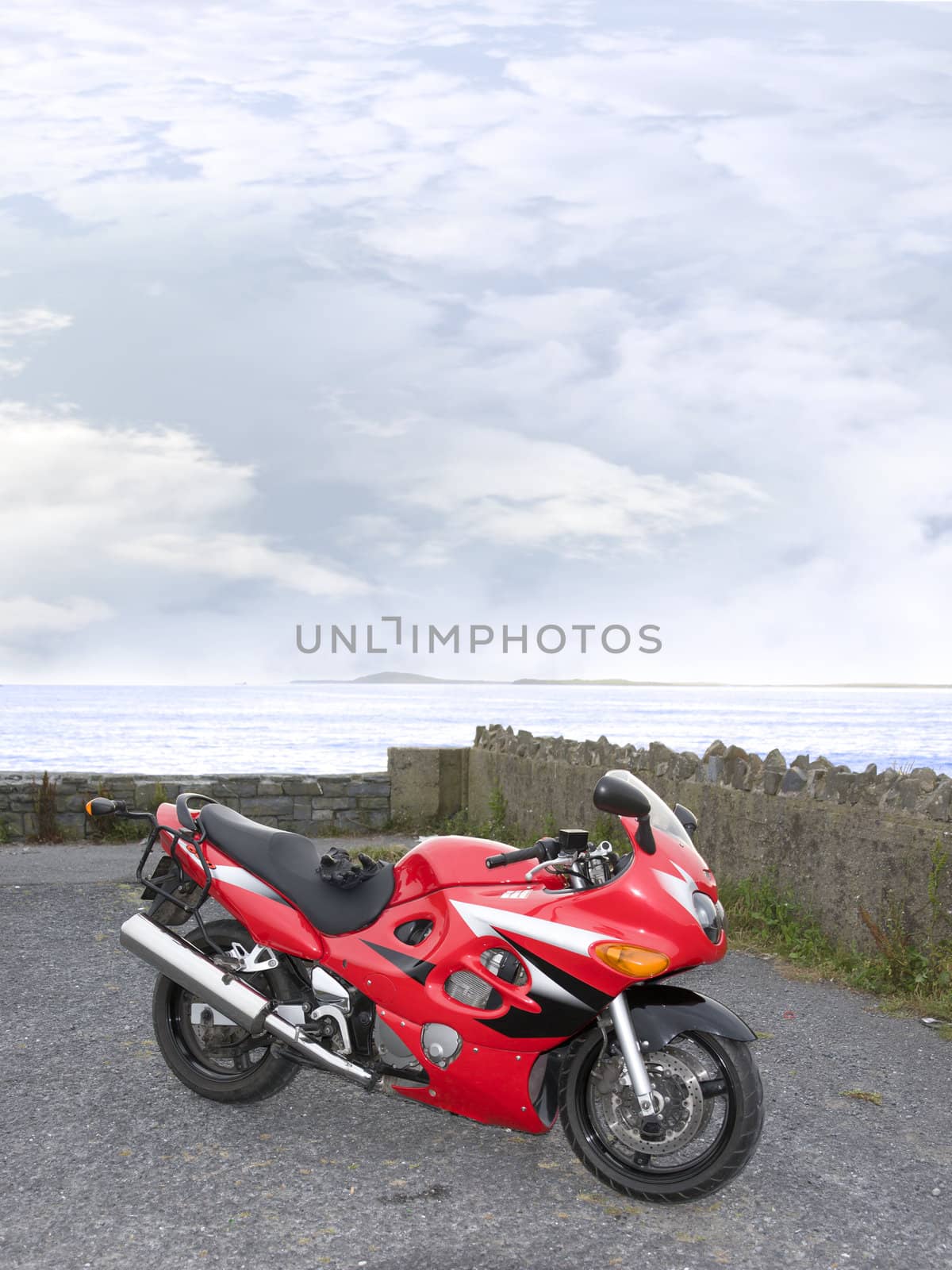 retro sports motorbike parked up in a scenic spot in ballybunion county kerry ireland