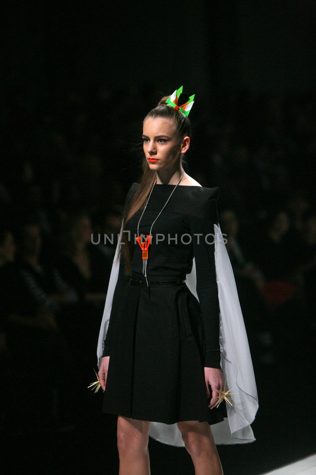 ZAGREB, CROATIA - MARCH 15: Fashion model wears clothes made by design group "Clash of 9" on "Dove FASHION.HR" show on March 15, 2012 in Zagreb, Croatia.