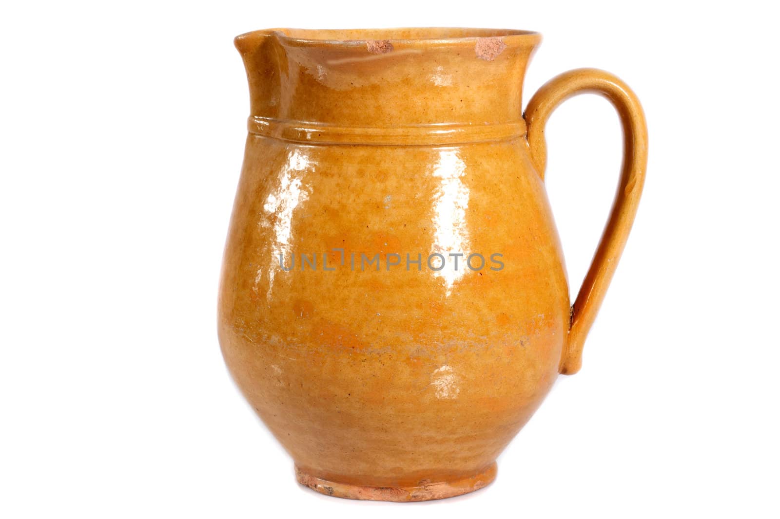 brown clay jug on a white background