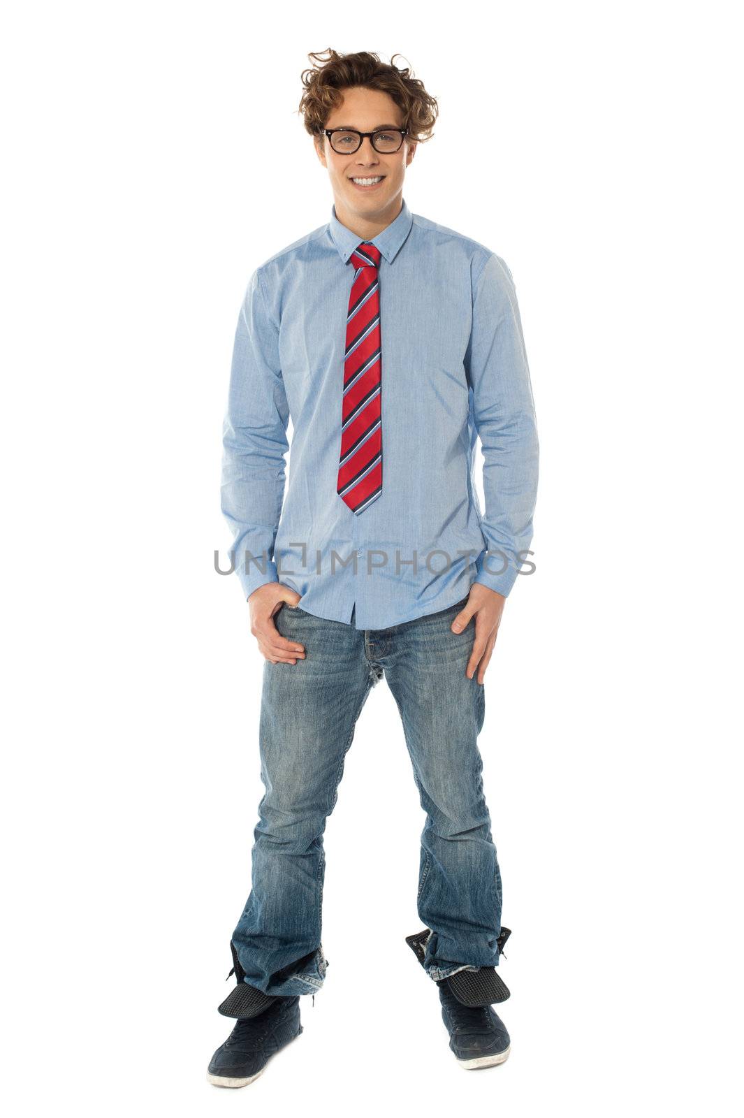 Handsome man standing casually with hands in pocket