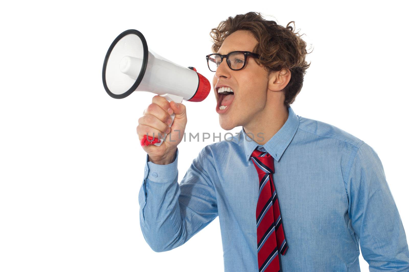 Young businessman using megaphone isolated over white background