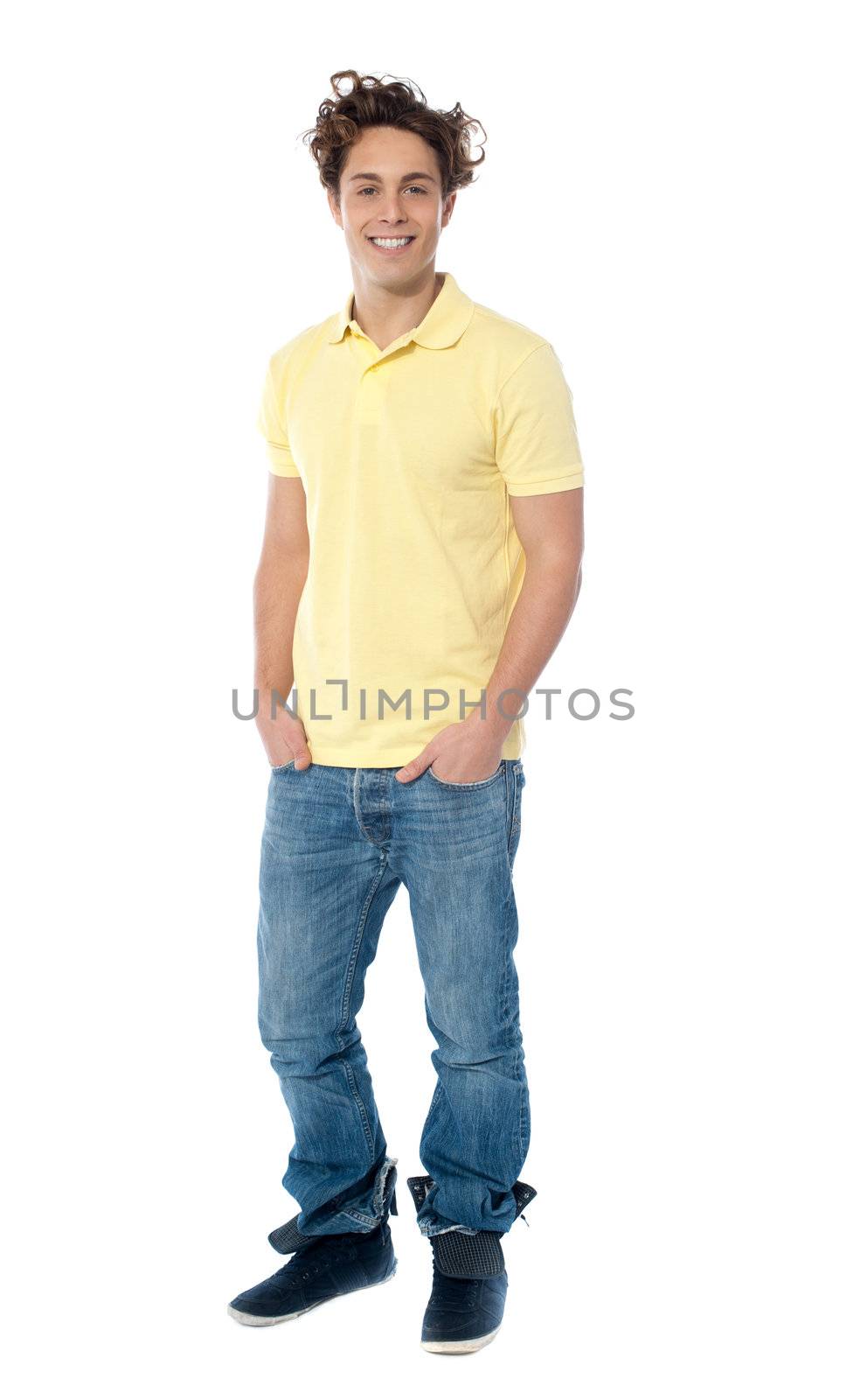 Full length image of a casual young man by stockyimages