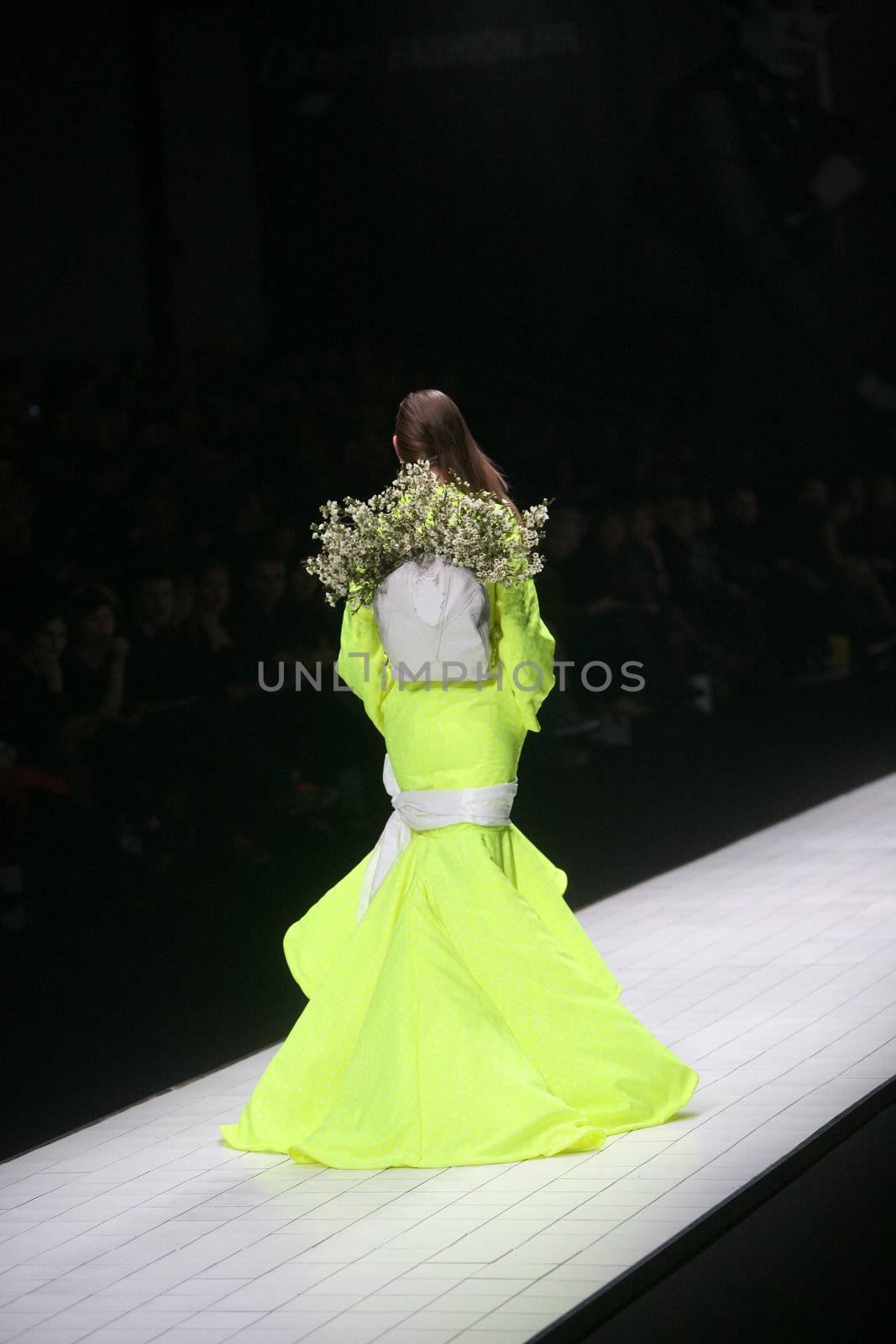 ZAGREB, CROATIA - MARCH 15: Fashion model wears clothes made by design group "Clash of 9" on "Dove FASHION.HR" show on March 15, 2012 in Zagreb, Croatia.