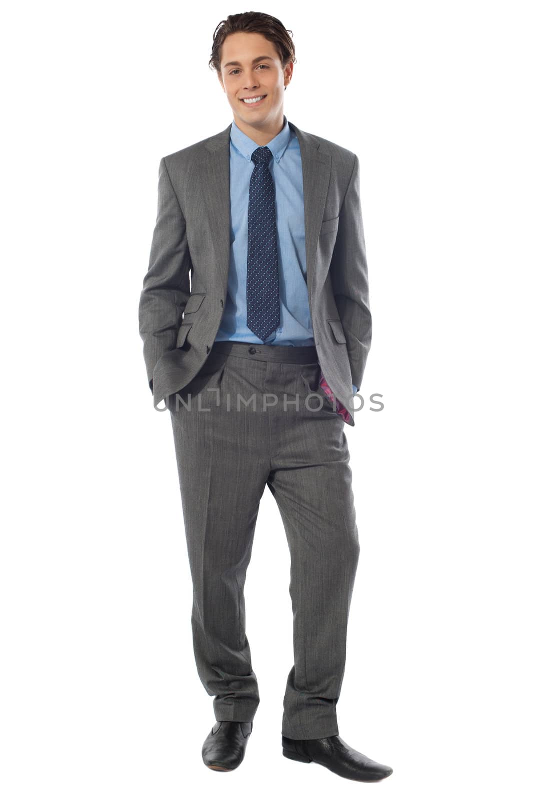 Portrait of happy smiling young businessman, isolated on white background