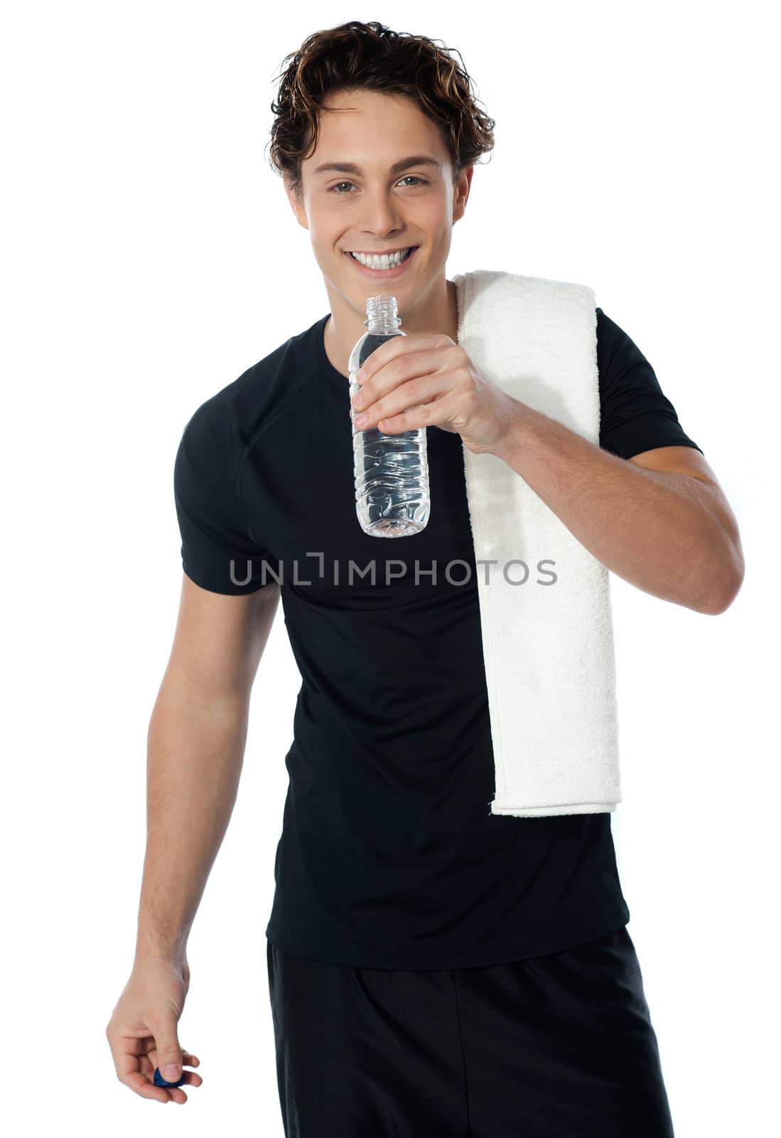 Fit man drinking water with towel on his shoulders isolated on white