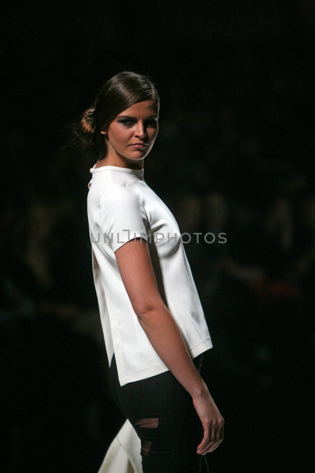 ZAGREB, CROATIA - MARCH 15: Fashion model wears clothes made by Aleksandar Zarevac on "Dove FASHION.HR" show on March 15, 2012 in Zagreb, Croatia.