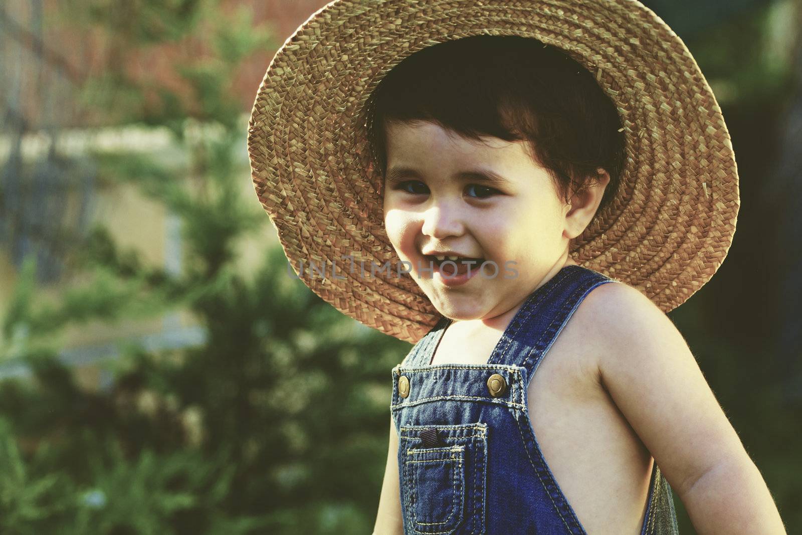 little baby boy gardener smiling playful vintage style by FernandoCortes
