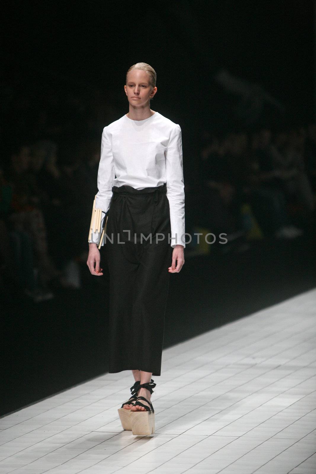 ZAGREB, CROATIA - MARCH 15: Fashion model wears clothes made by Matija Cop on "Dove FASHION.HR" show on March 15, 2012 in Zagreb, Croatia.