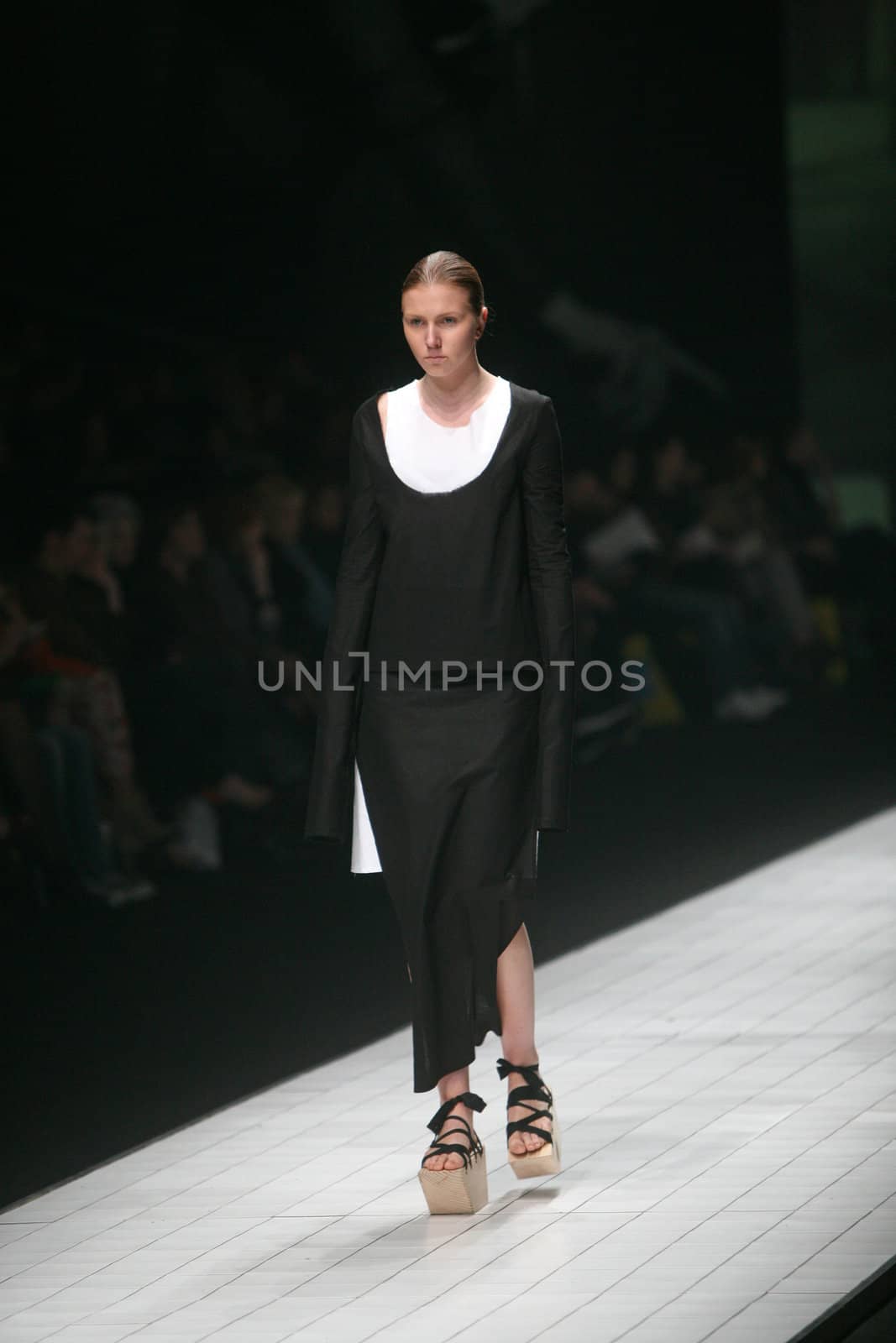 ZAGREB, CROATIA - MARCH 15: Fashion model wears clothes made by Matija Cop on "Dove FASHION.HR" show on March 15, 2012 in Zagreb, Croatia.