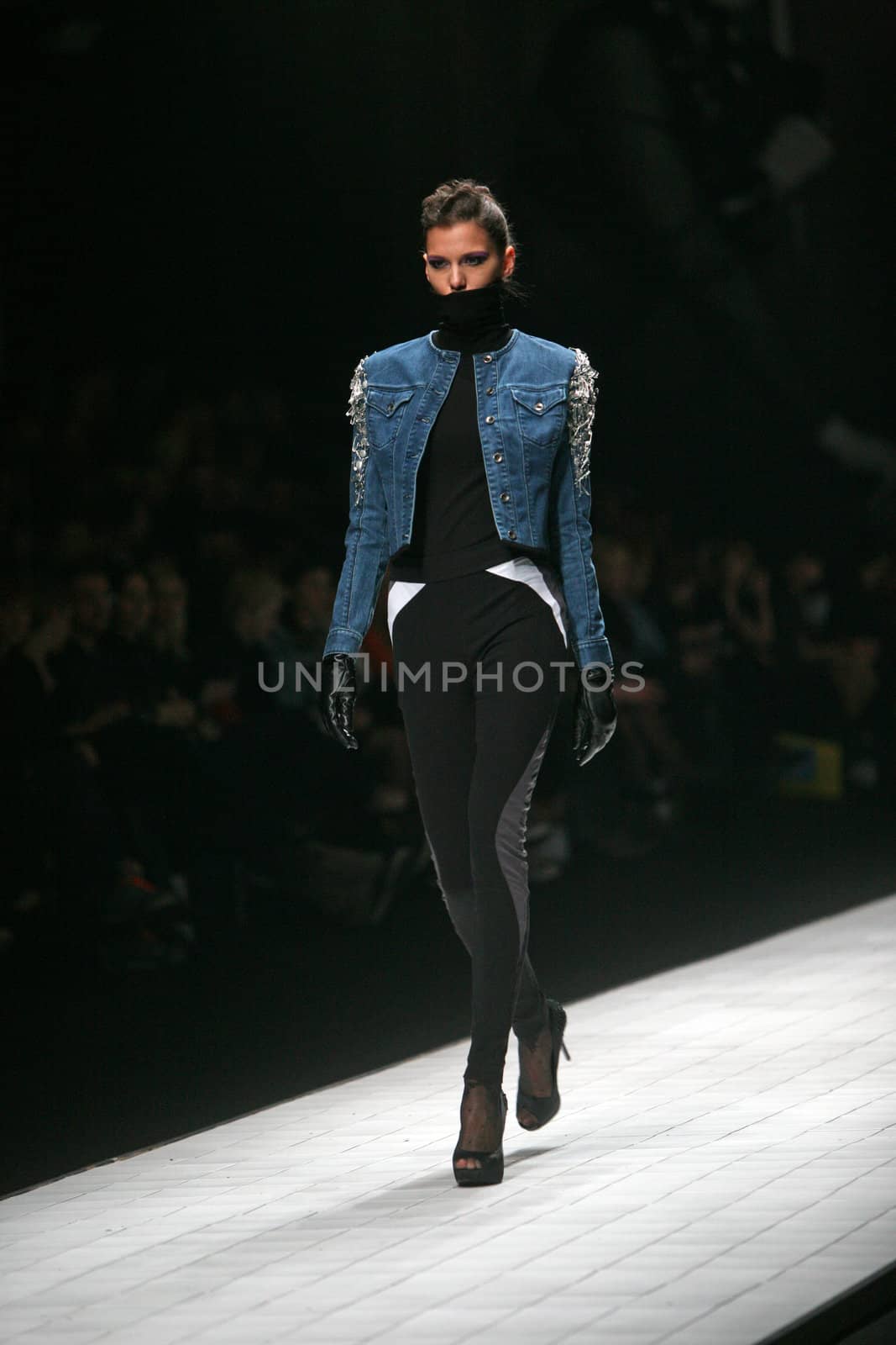 ZAGREB, CROATIA - MARCH 15: Fashion model wears clothes made by AMDS by Alduk on "Dove FASHION.HR" show on March 15, 2012 in Zagreb, Croatia.