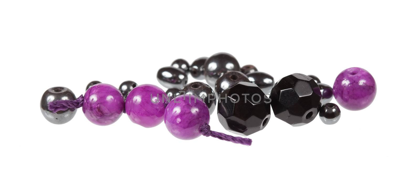 Set of beads for making jewelry. Isolated on white background