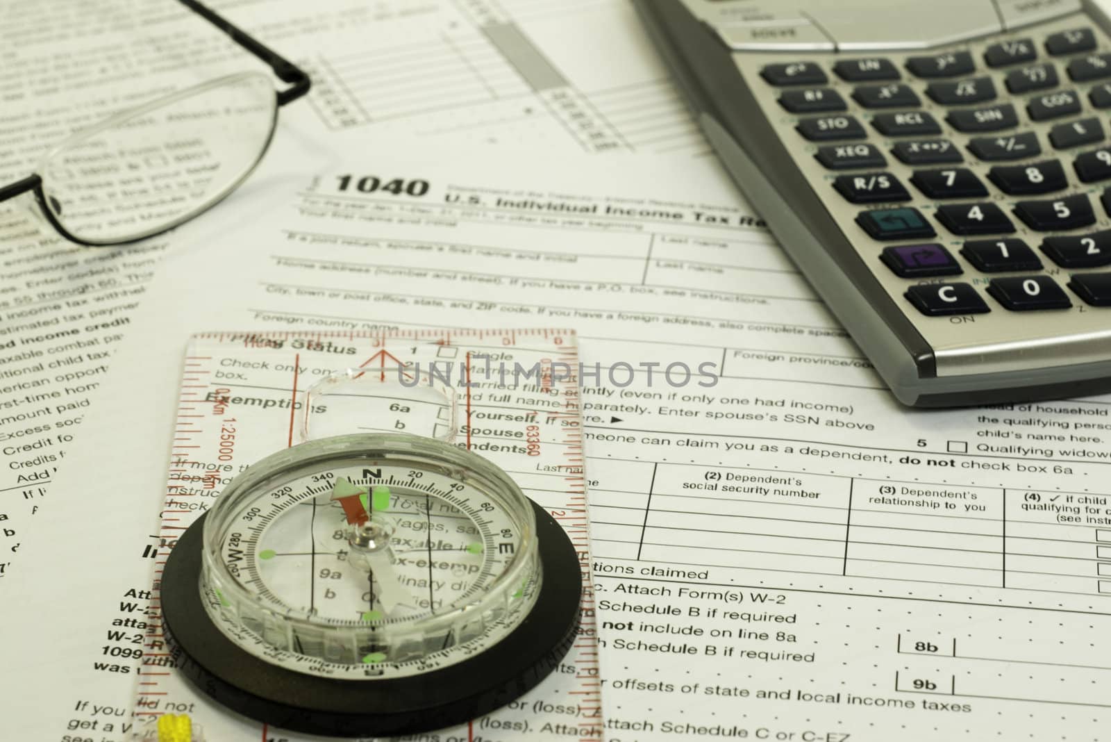 compass, tax time by kjcimagery