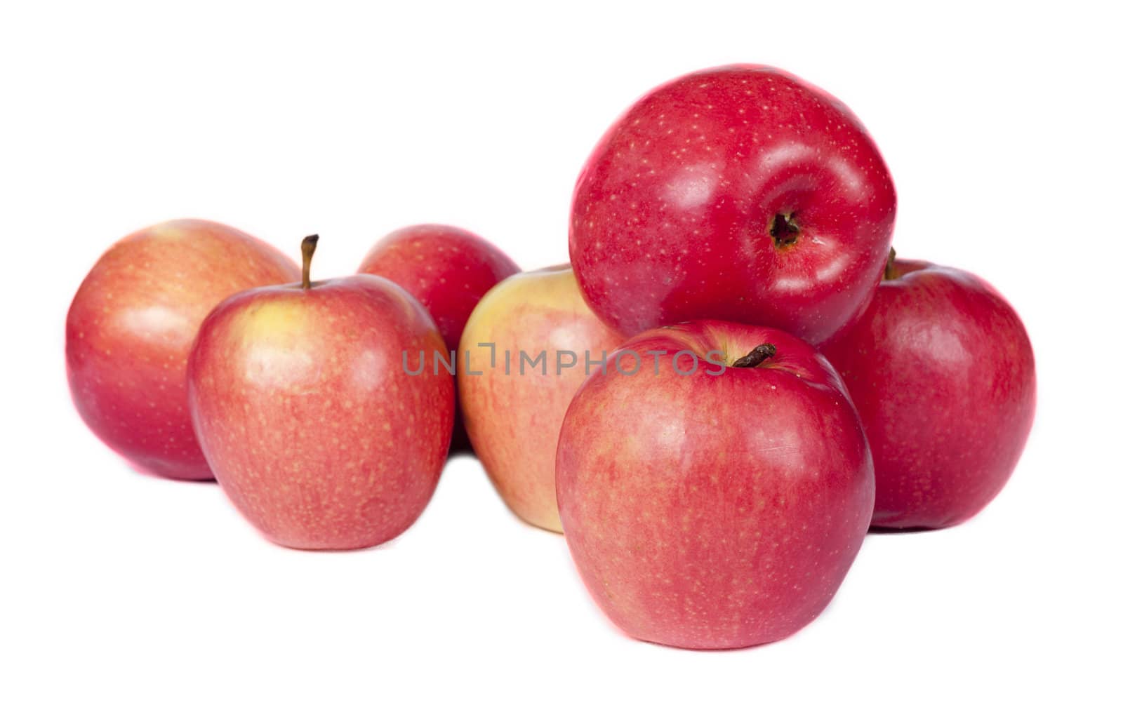 juicy red apples on a white background