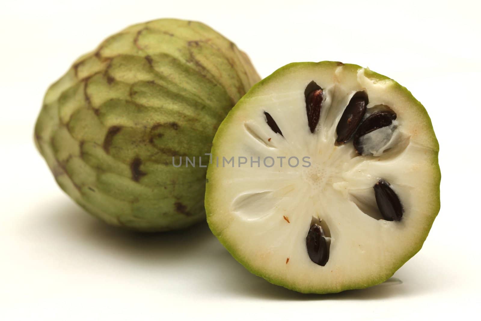 isolated cherimoya fruit by Teka77