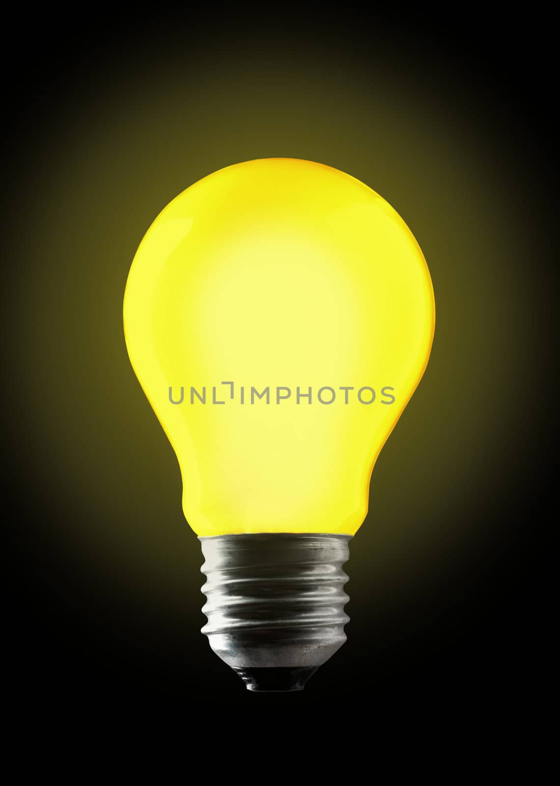 Yellow light bulb on black background.