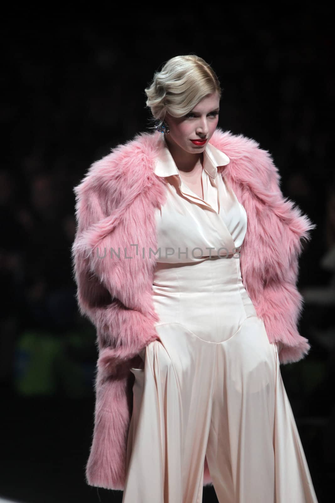 ZAGREB, CROATIA - MARCH 16: Fashion model wears clothes made by Aleksandra Dojcinovic on "Dove FASHION.HR" show on March 16, 2012 in Zagreb, Croatia.