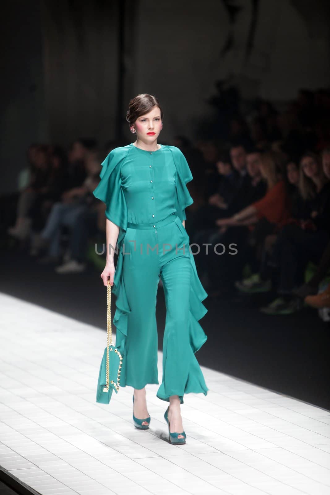 ZAGREB, CROATIA - MARCH 16: Fashion model wears clothes made by Aleksandra Dojcinovic on "Dove FASHION.HR" show on March 16, 2012 in Zagreb, Croatia.