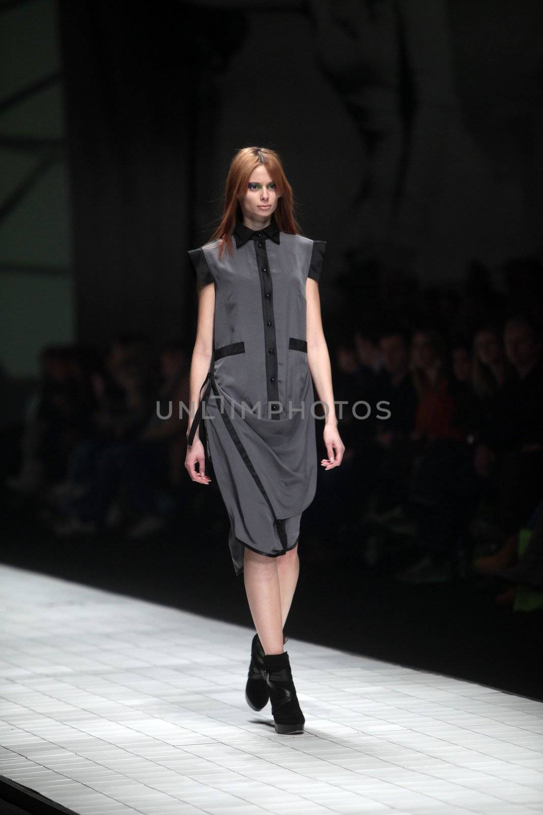 ZAGREB, CROATIA - MARCH 16: Fashion model wears clothes made by Ana Maria Ricov on "Dove FASHION.HR" show on March 16, 2012 in Zagreb, Croatia.