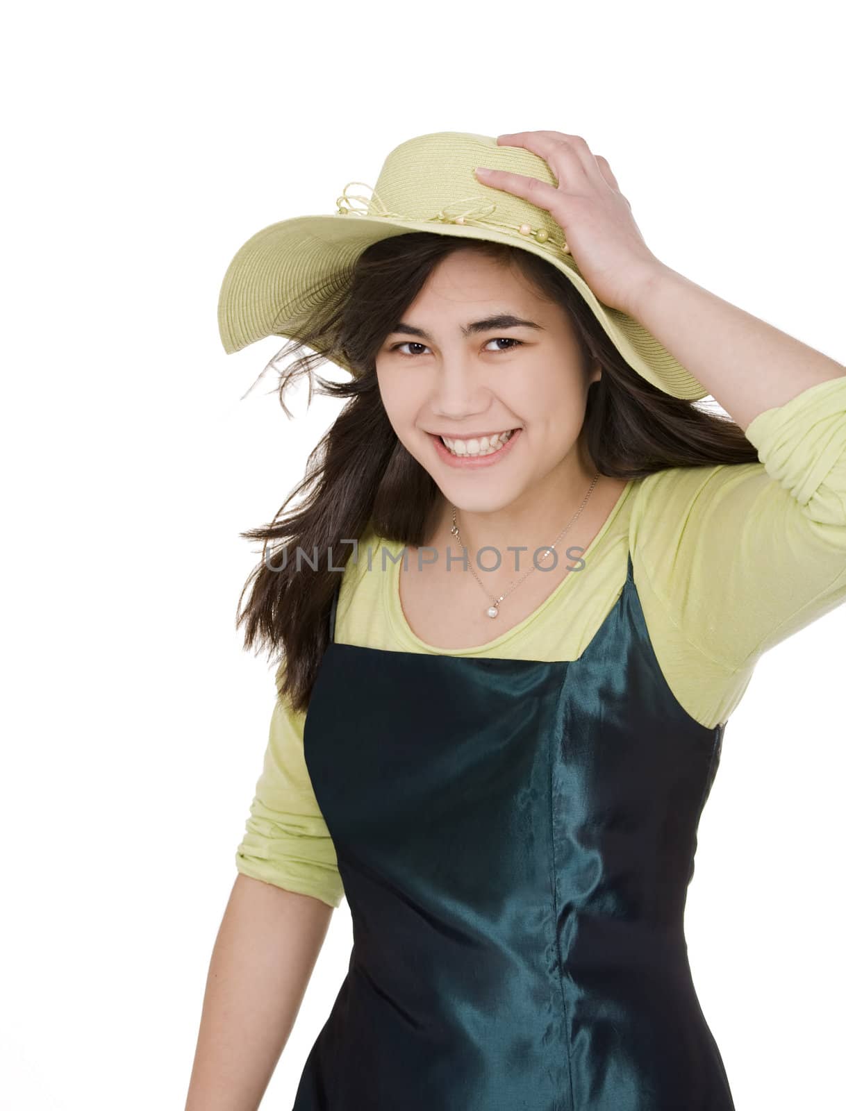Smiling teen girl in green dress and lime green hat, by jarenwicklund