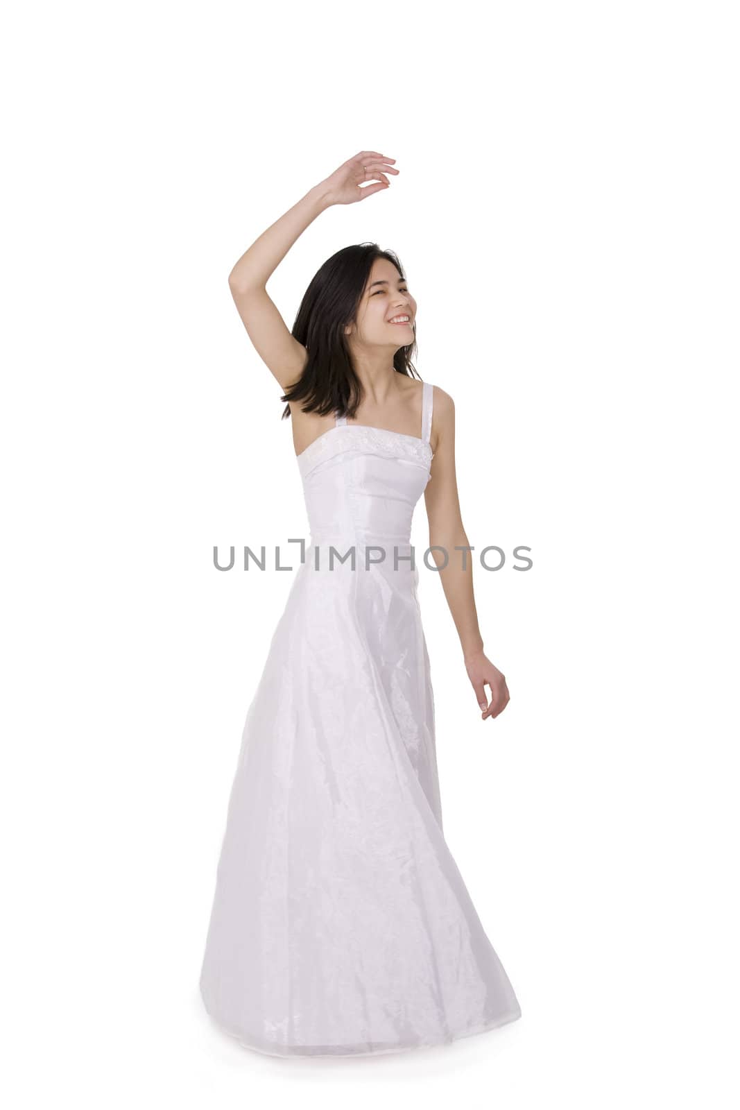 Beautiful young teen girl in white dress or gown twirling by jarenwicklund