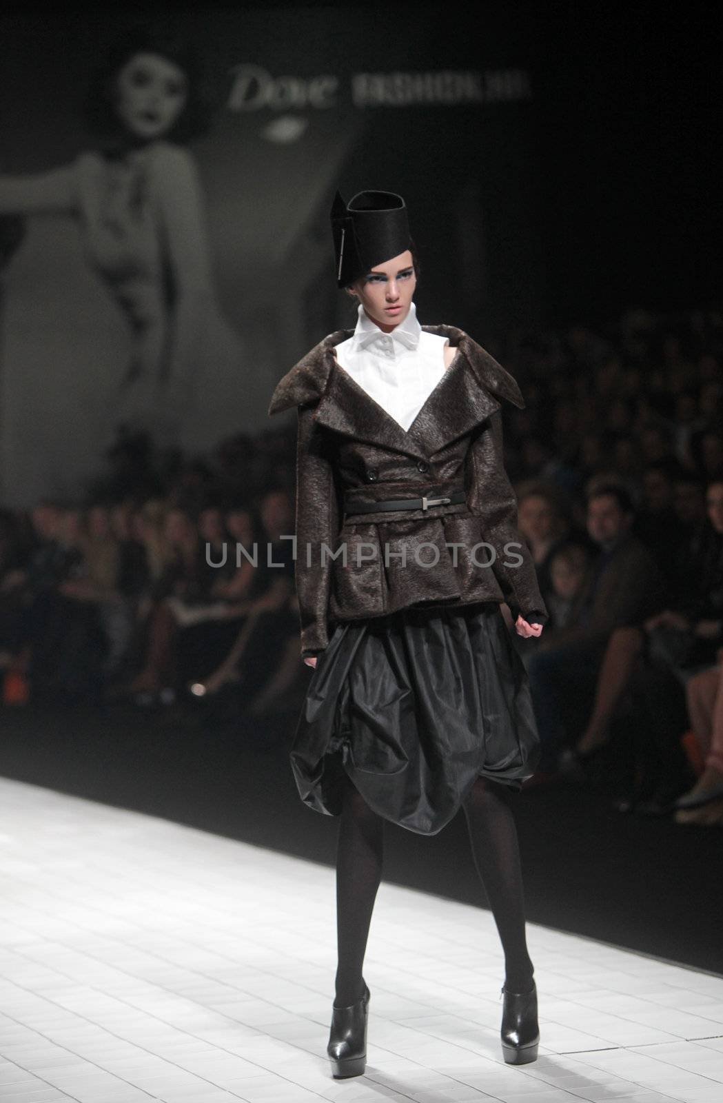 ZAGREB, CROATIA - MARCH 17: Fashion model wears clothes made by Branka Donassy on "Dove FASHION.HR" show on March 17, 2012 in Zagreb, Croatia.