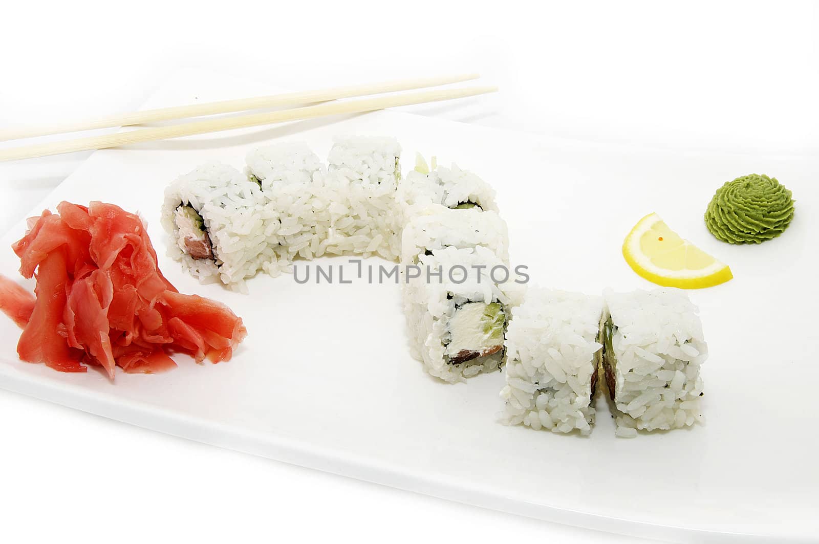 sushi rice decorated with red fish and lemon