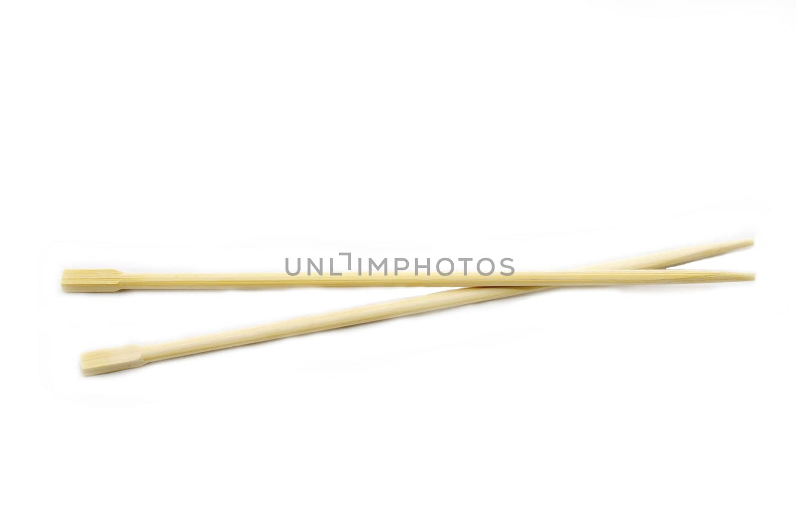 two Japanese wooden chopsticks on a white background