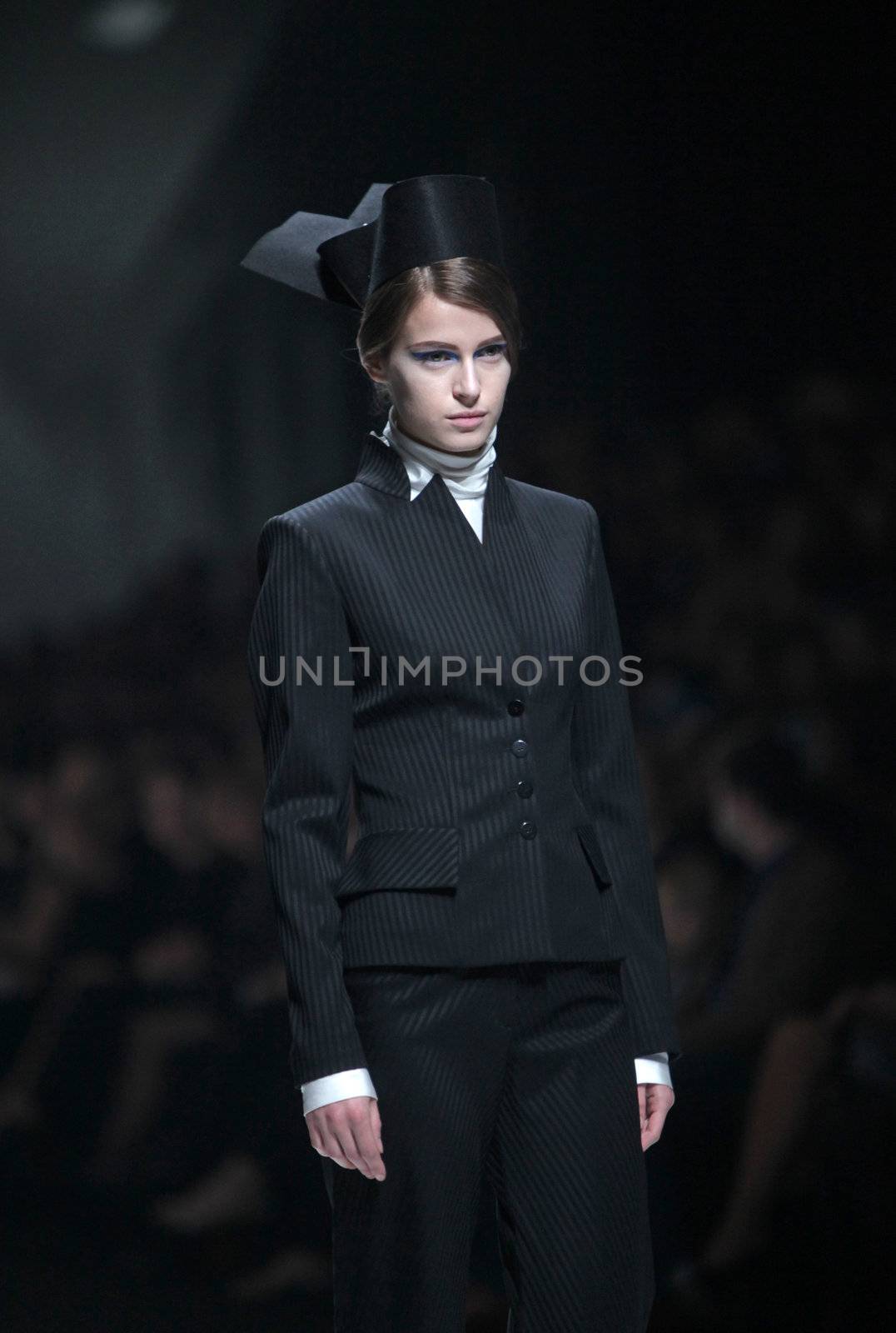 ZAGREB, CROATIA - MARCH 17: Fashion model wears clothes made by Branka Donassy on "Dove FASHION.HR" show on March 17, 2012 in Zagreb, Croatia.