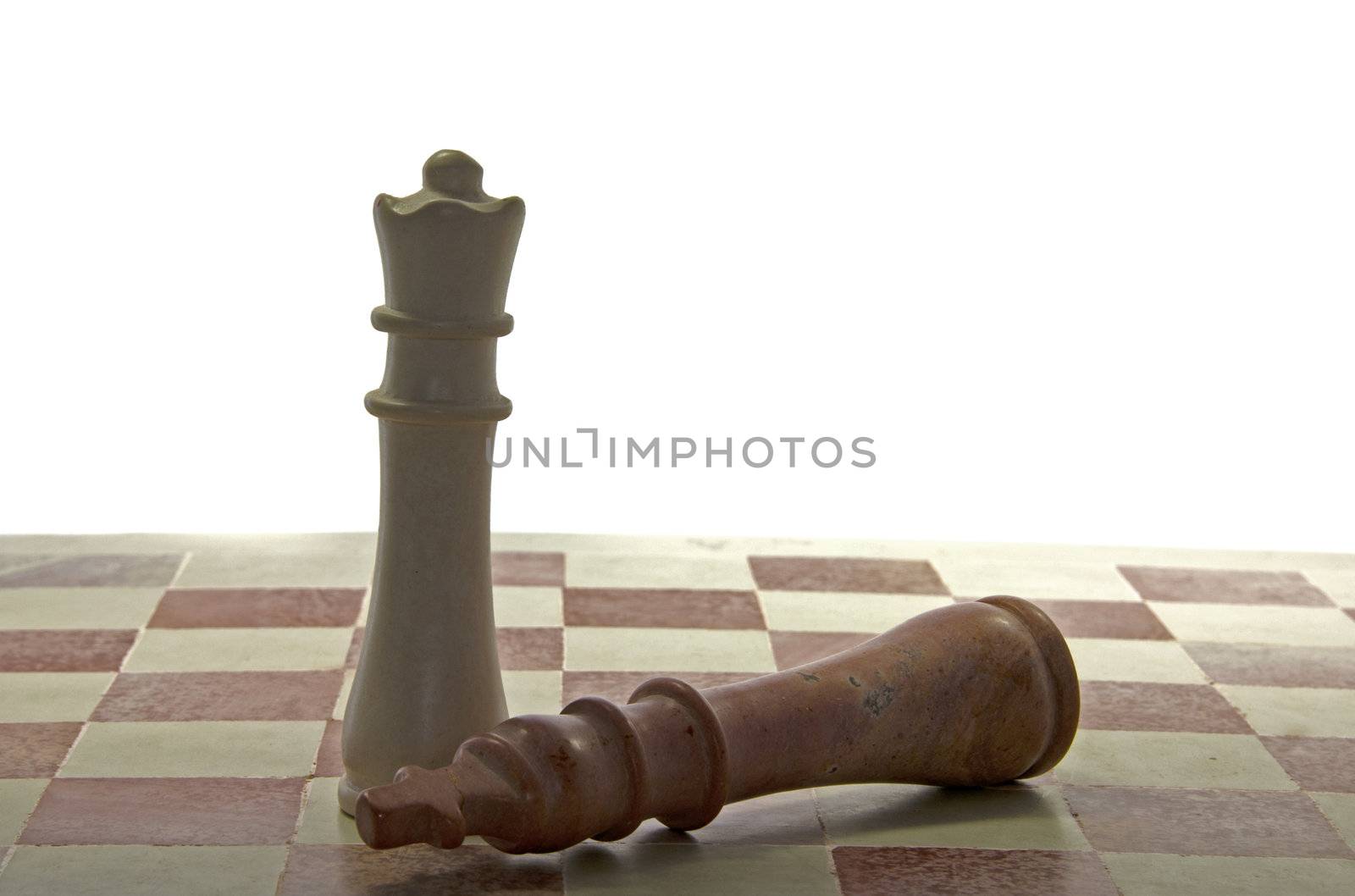 queen wins from the king on chess board