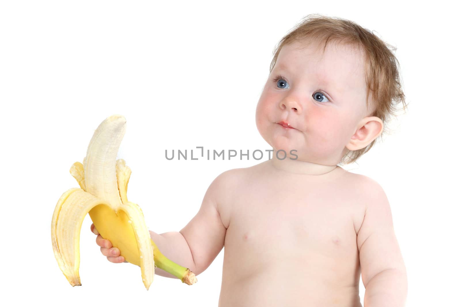 the little blue-eyed girl eats banana. a portrait on a white background. option 3