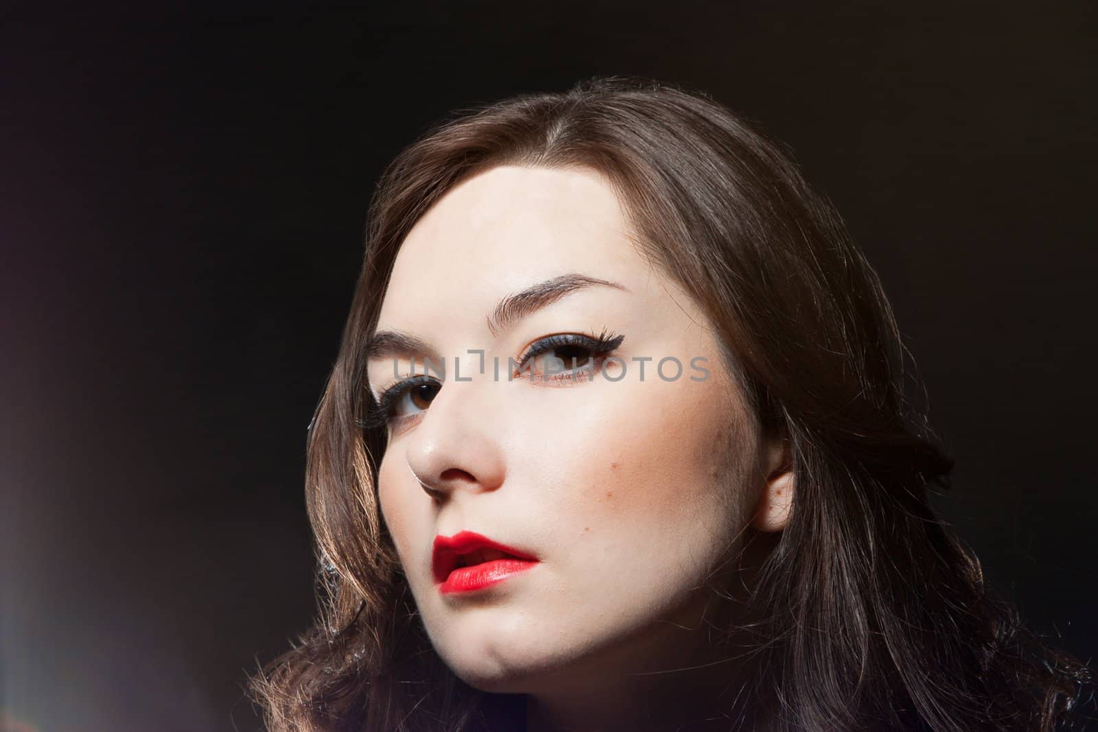 portrait of sensual young woman on dark background by nigerfoxy