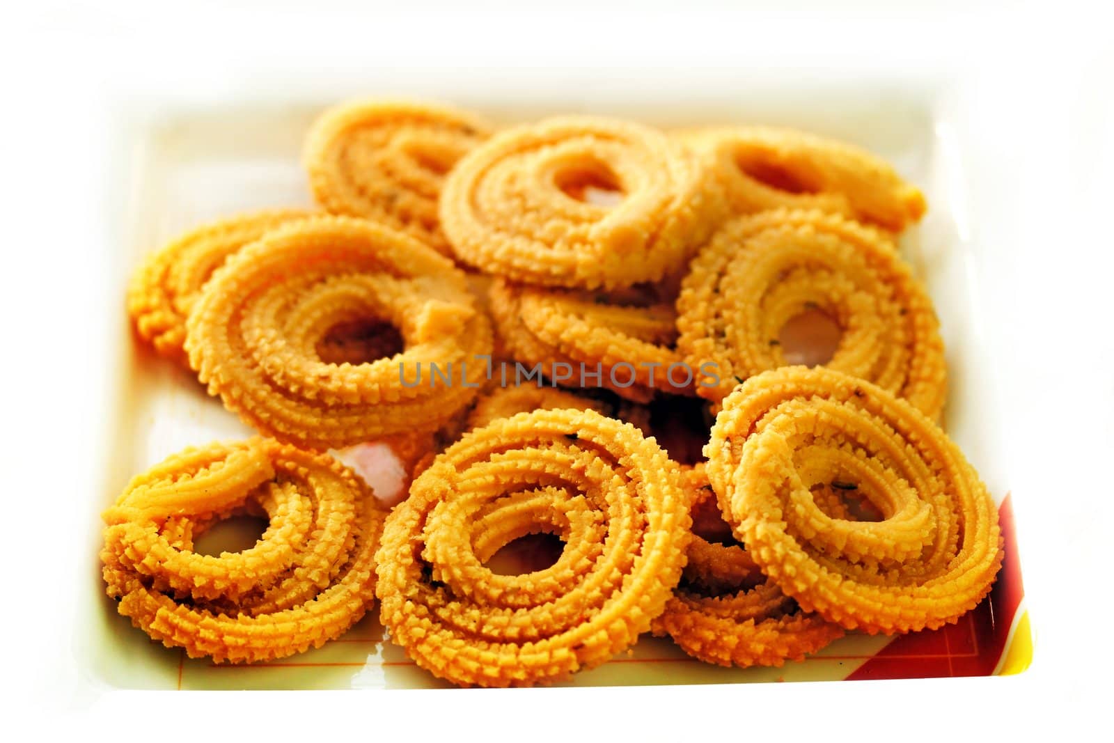 Popular south indian deep fried snack called murukku or muruku.