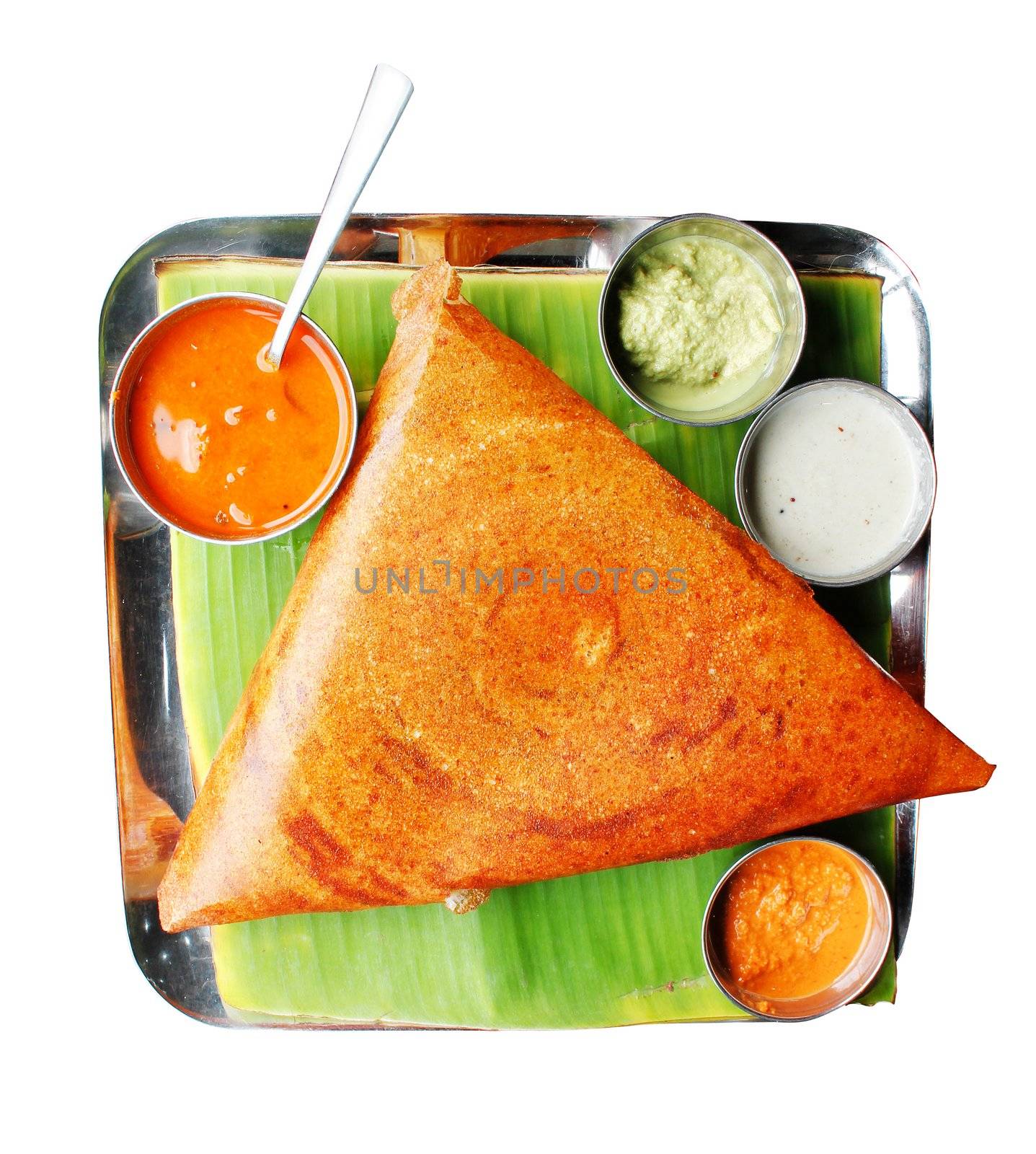 South indian breakfast dosa in golden brown color  by mnsanthoshkumar