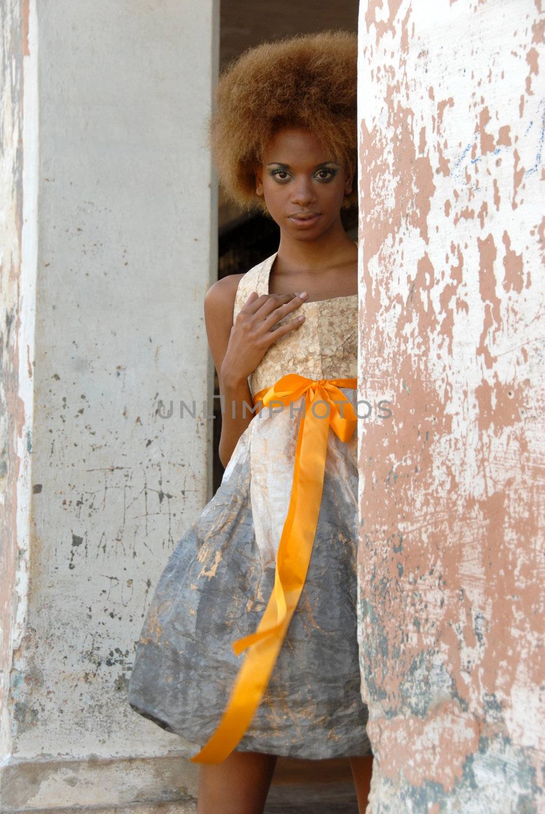 La Habana, Cuba-February 11, 2009:Cuban model wears clothes made of paper.The difficulty in obtaining the tissues,has stimulated the designer is the 'avant-garde Lazarus Dobauchet Rodriguez