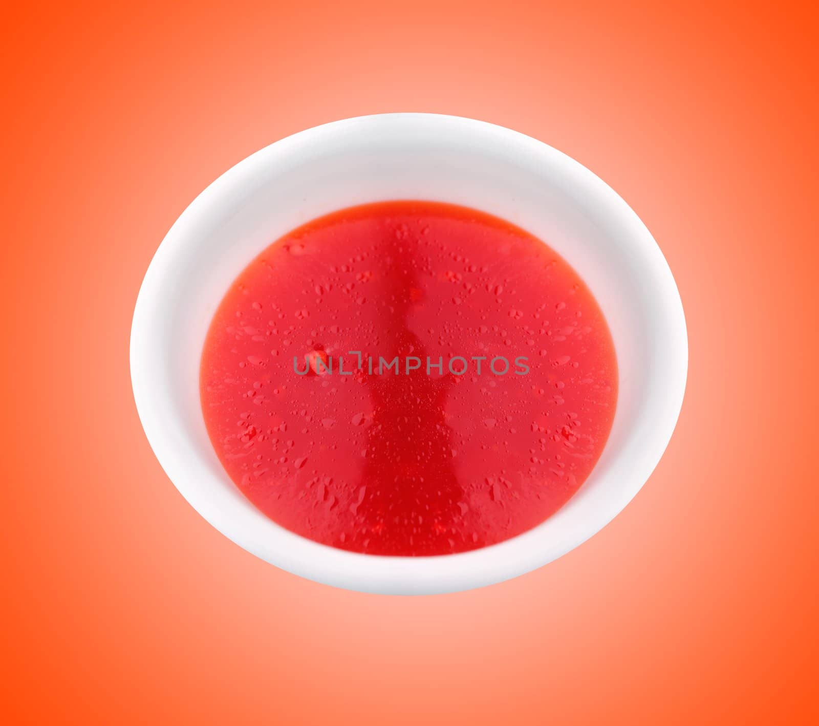 Delicious vegetable tomato soup closeup by mnsanthoshkumar