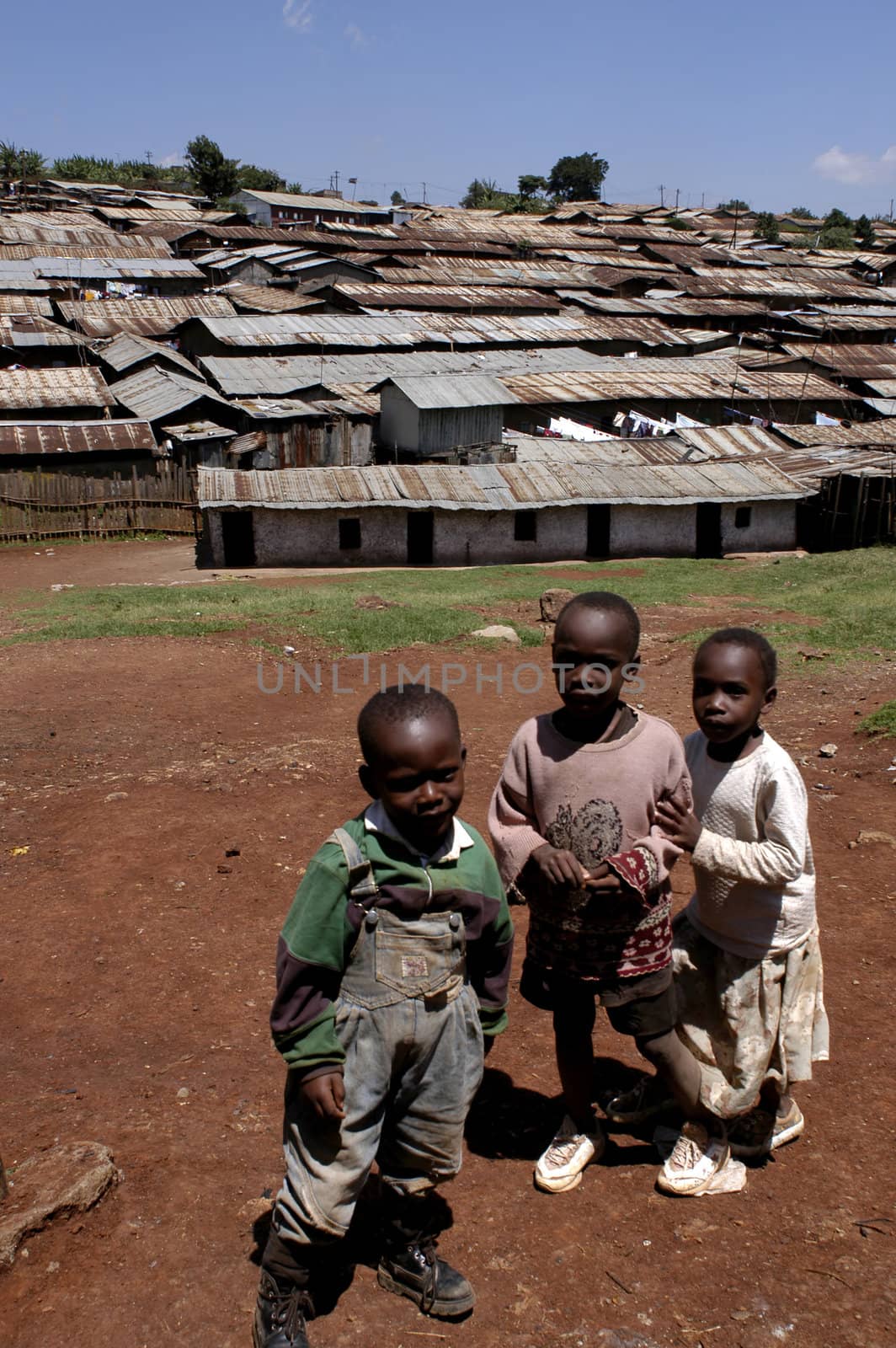 Nairobi, Kenya-January 27, 2004:children living in Kibera.Is the largest slum in Africa in the center of Nairobi.There are no toilets,the sewers are open.There are many orphans, and HIV disease,malaria