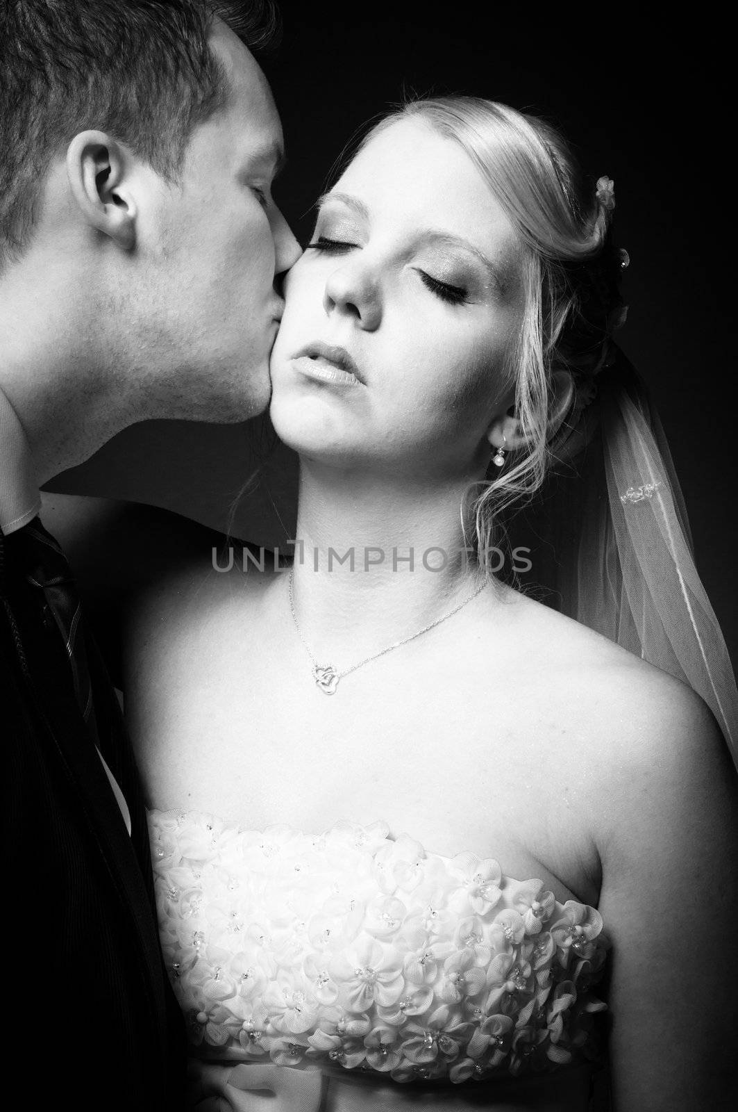 Young couple kissing in black and white by svedoliver