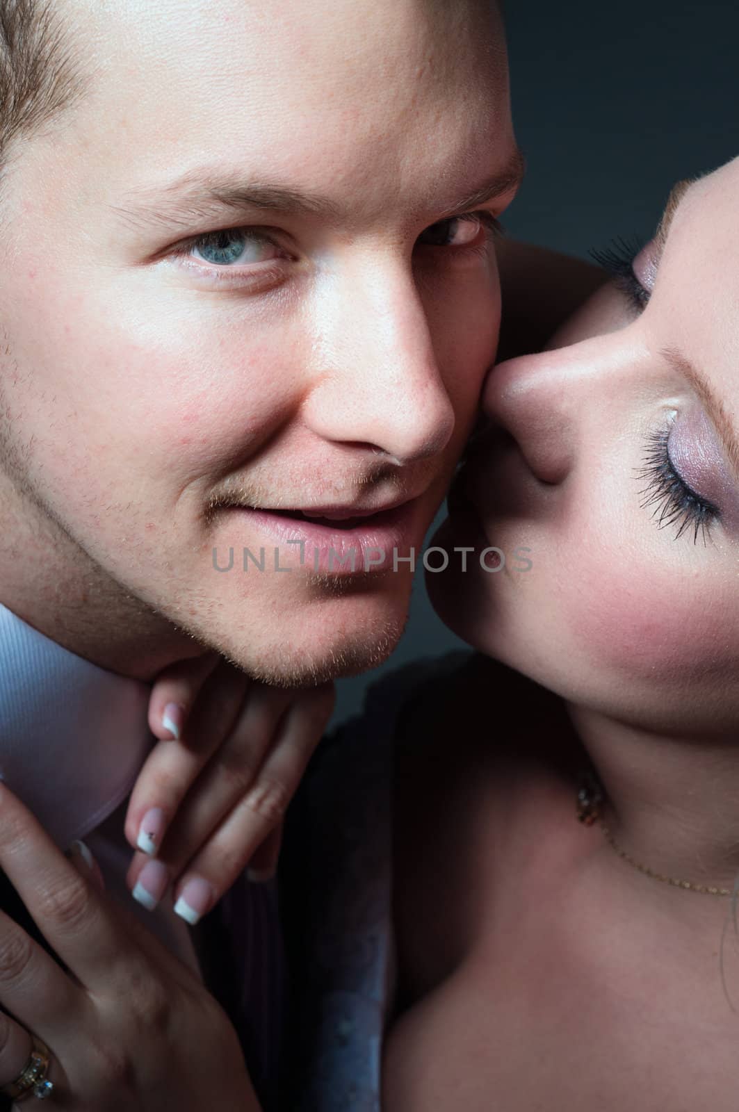 Beautiful bride kissing groom by svedoliver