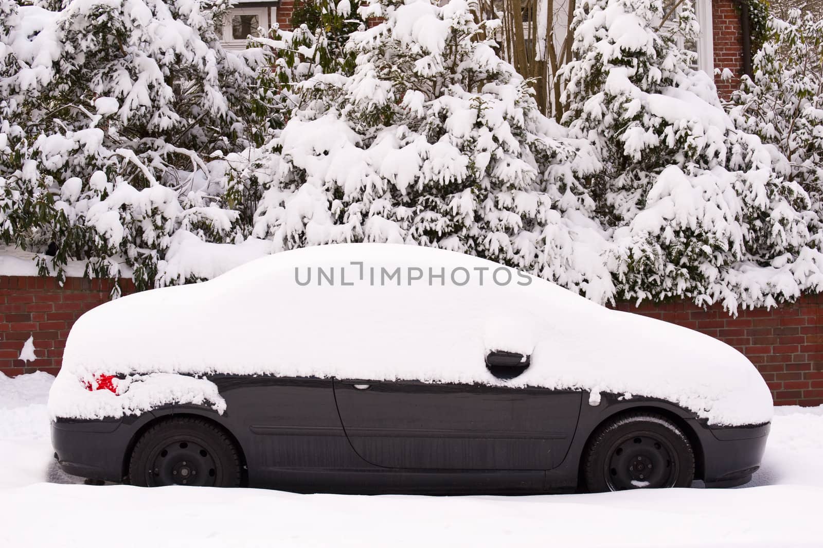 Snow covered car