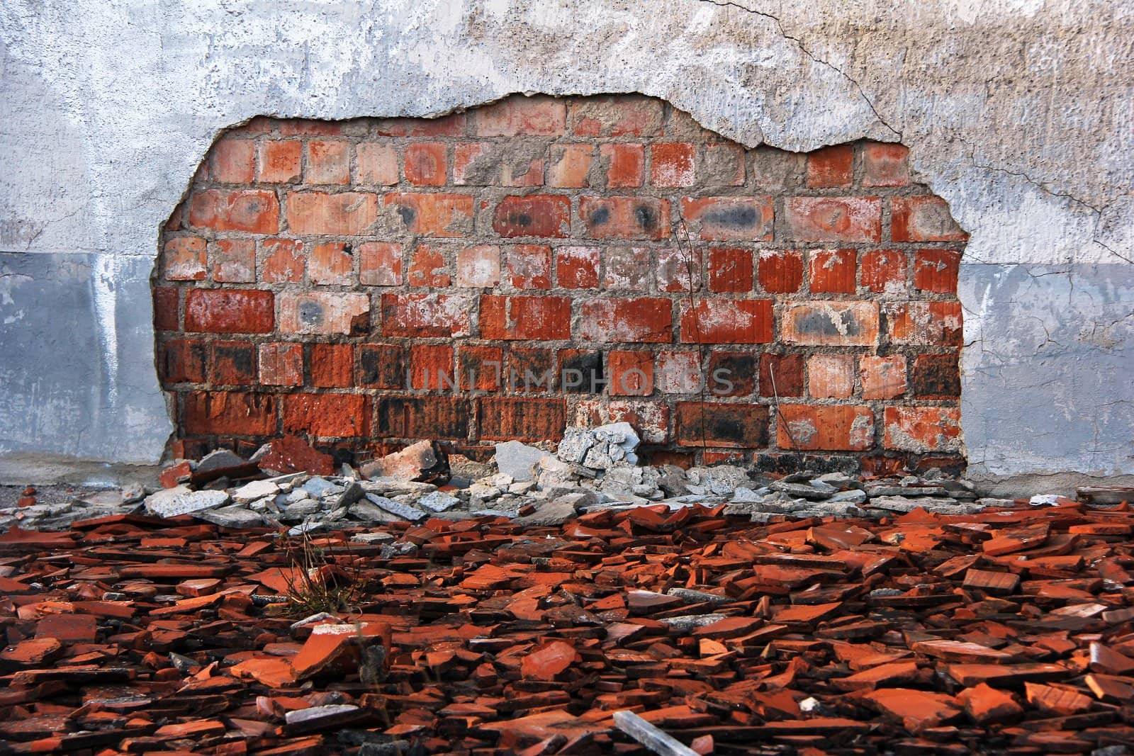 old damaged wall of an old building