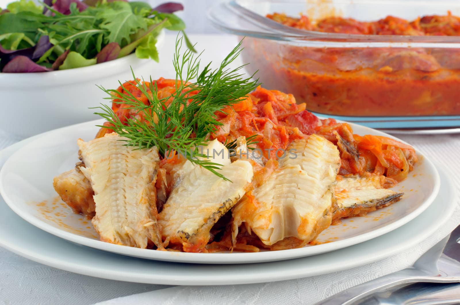 Baked fish in tomato sauce with vegetables by Apolonia