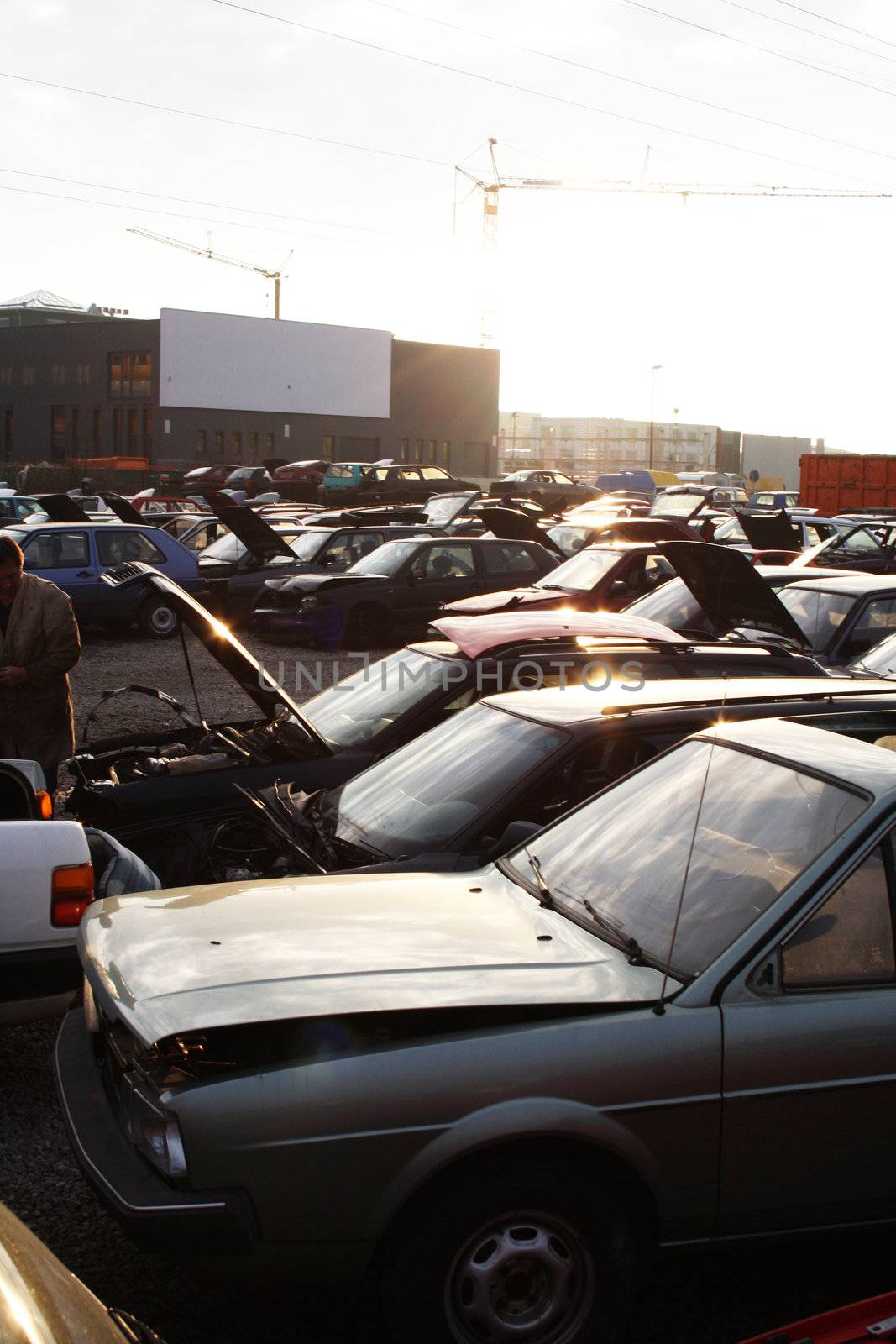 scrap yard for recycling cars by photochecker