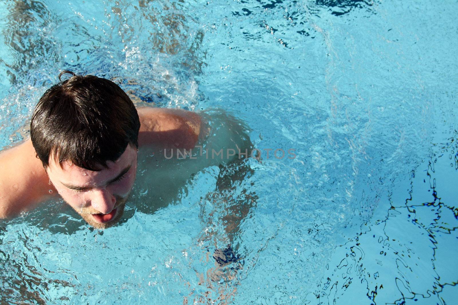 man in the water by photochecker