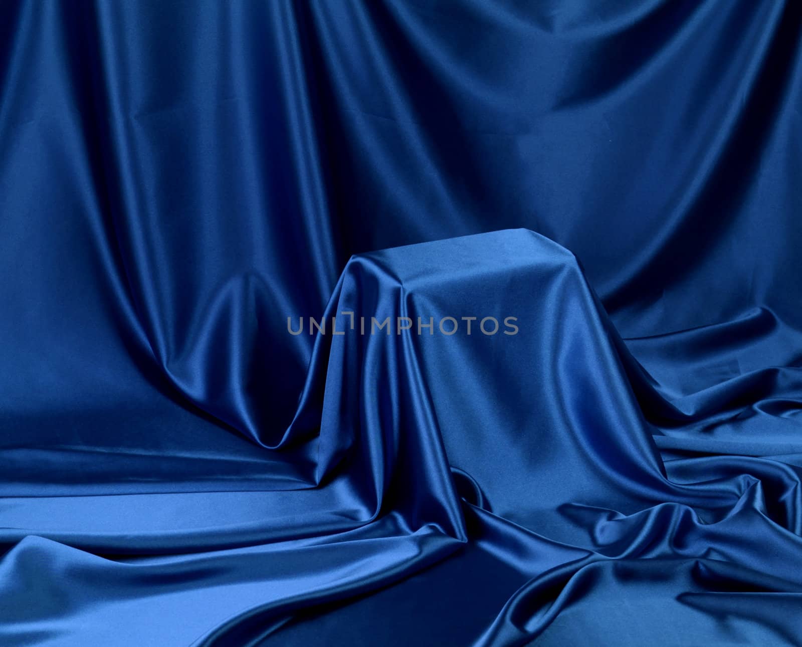 Something secret veiled under satin silky cloth fabric