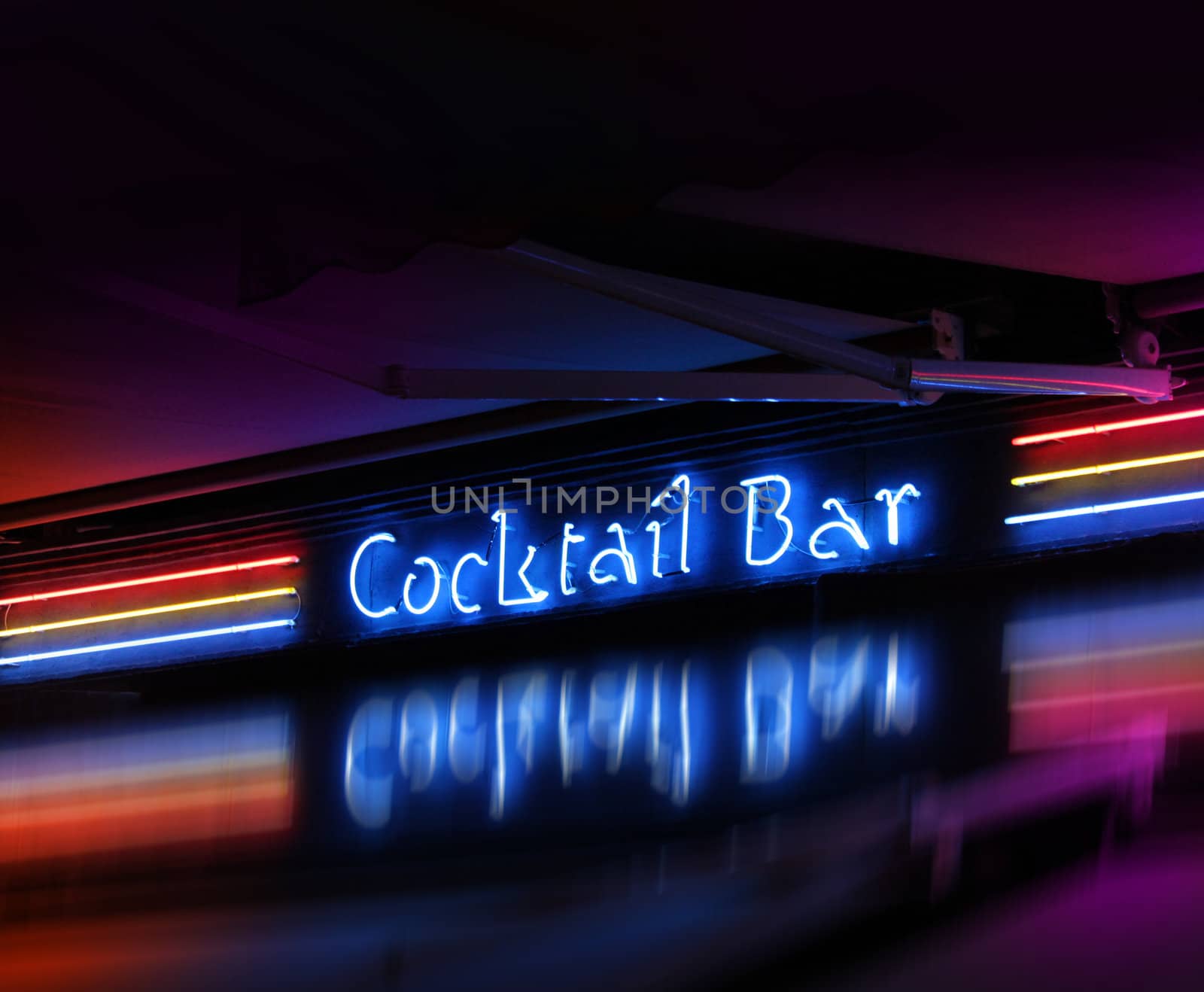 Coctail bar neon sign glowing by anterovium