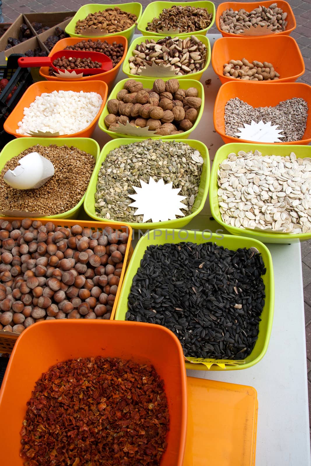 Variety of nuts on street market.