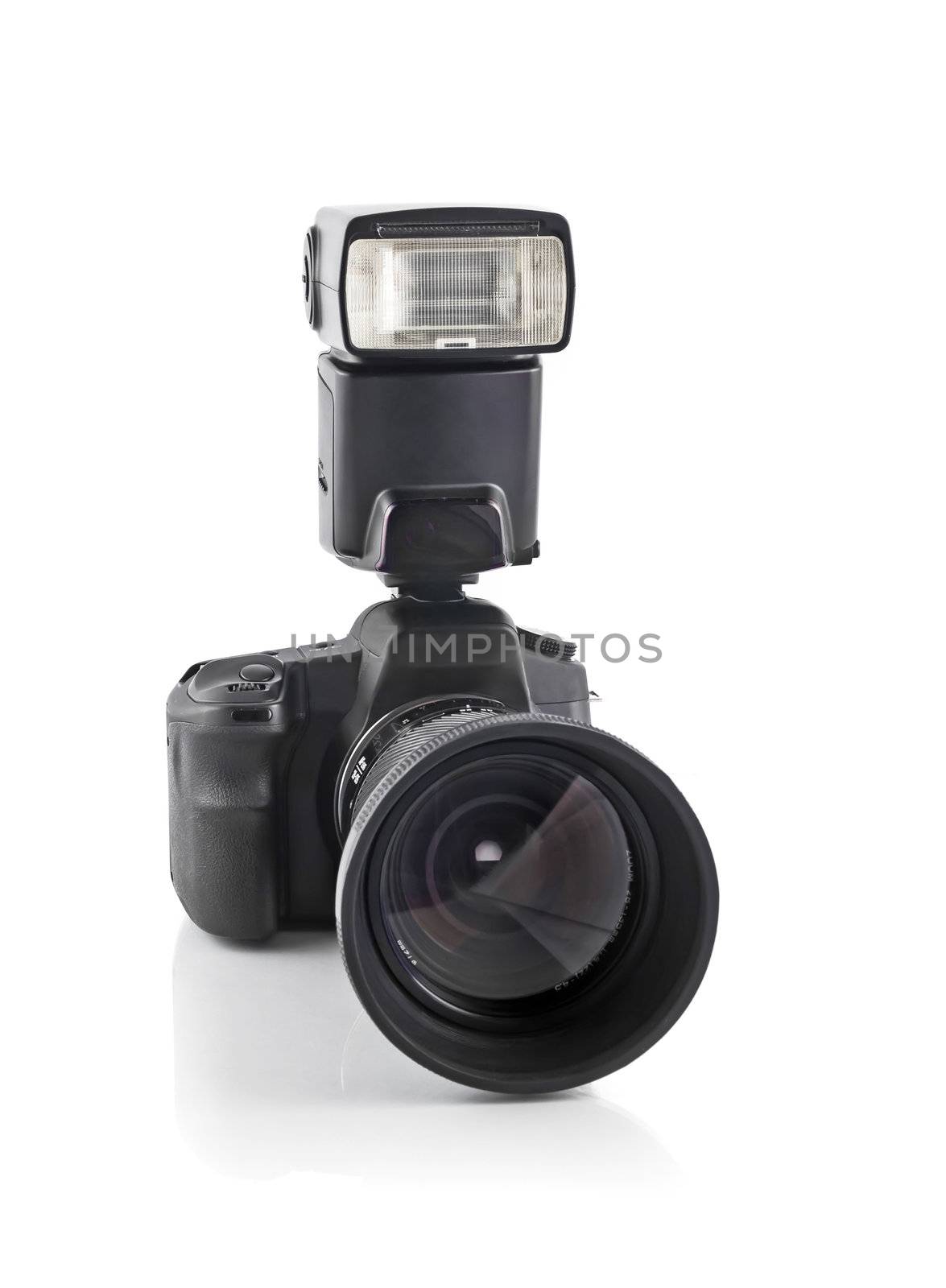 Professional DSLR camera with telephoto lens and flash by Arsgera