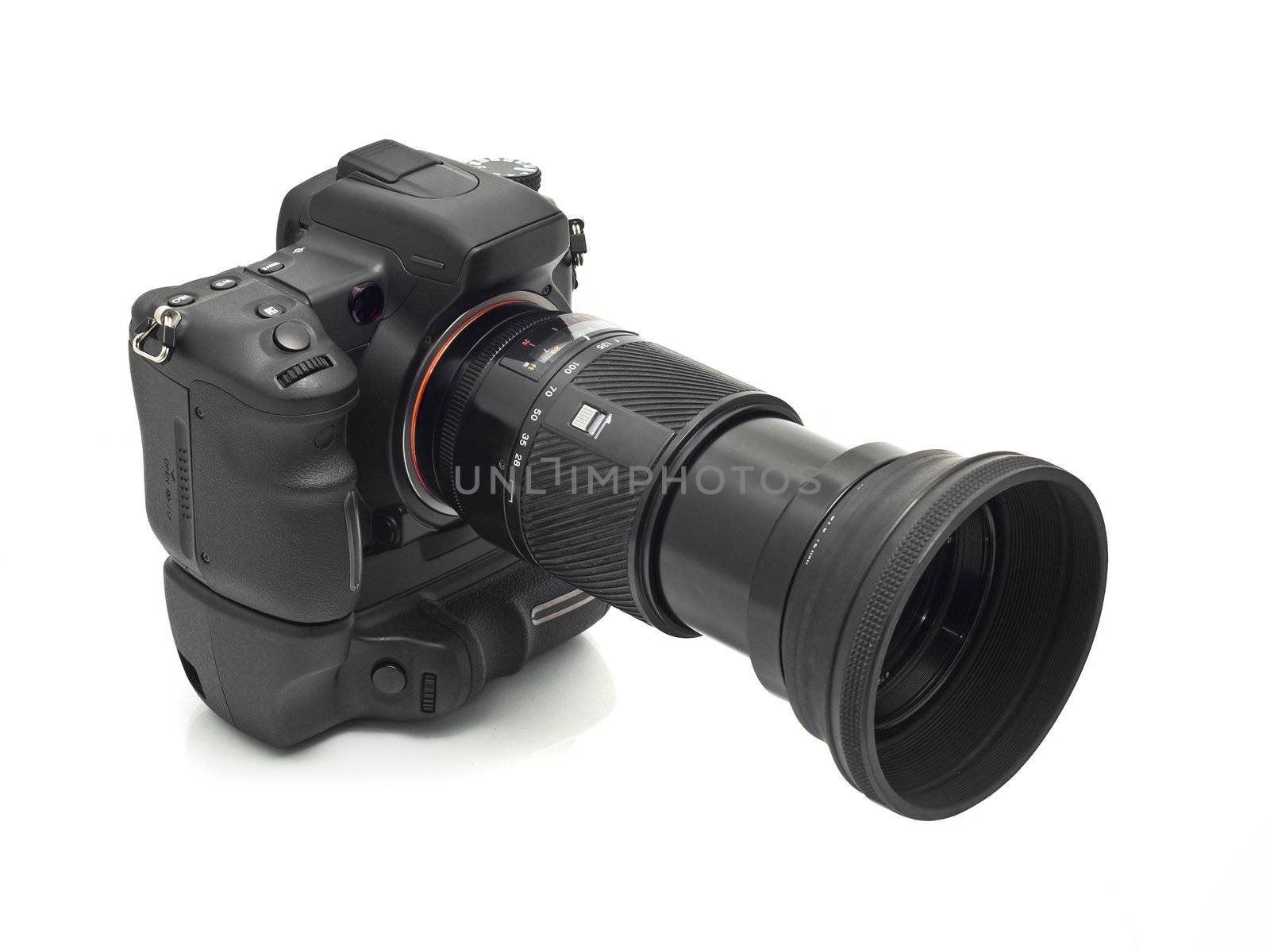 Professional DSLR camera with telephoto lens isolated over white