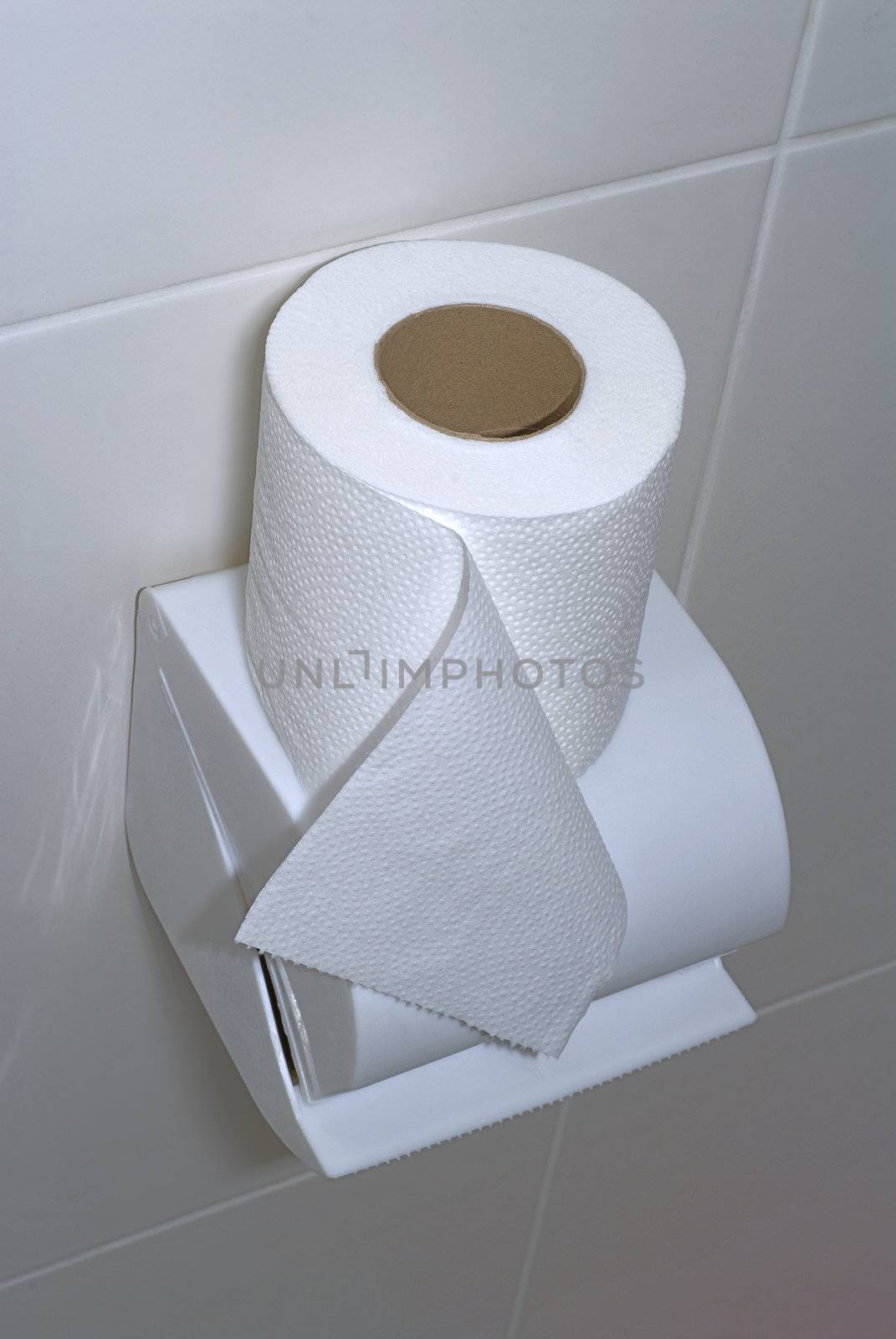 close up of white toilet paper on white background