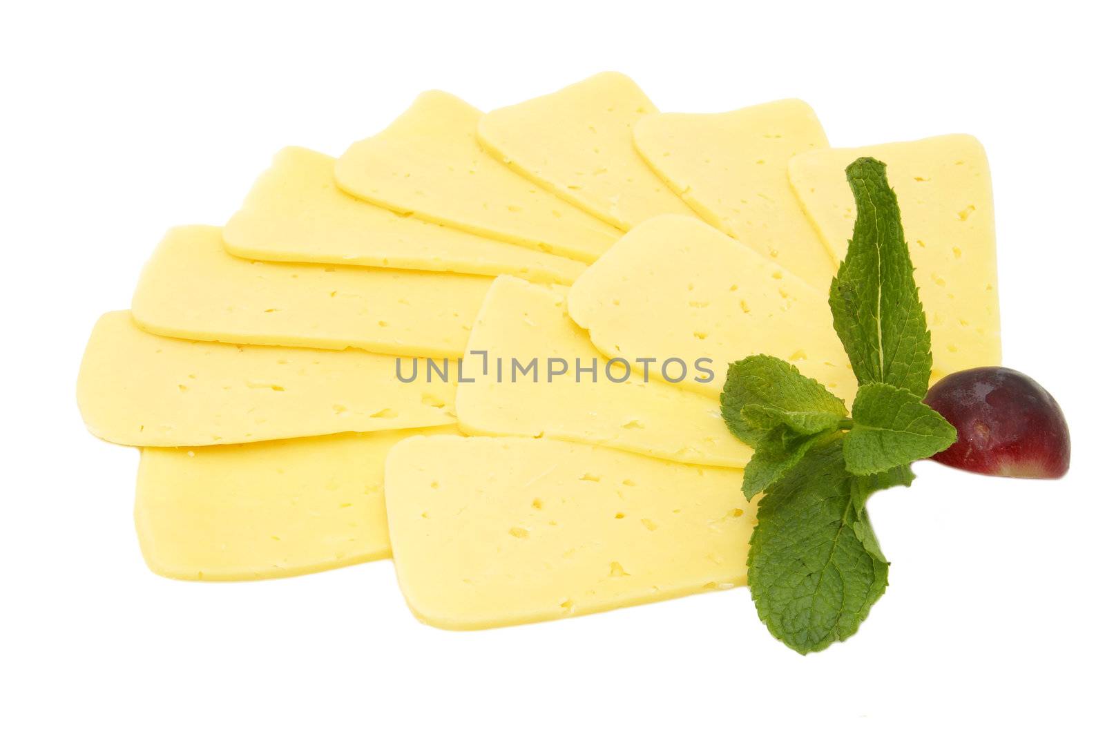 cheese is sliced and decorated with radishes and mint on a white background